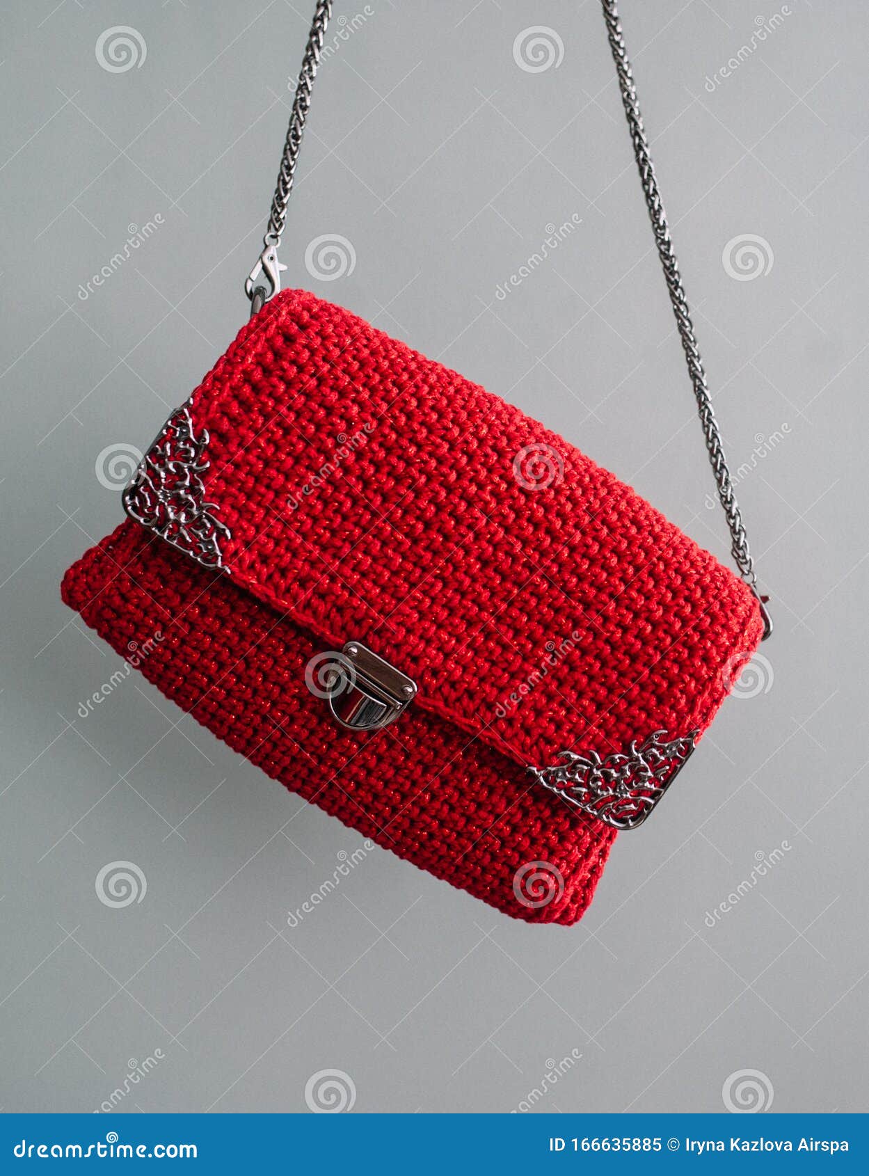 Red Crochet Knitted Bag ,made from Nylon Thread Isolated on Gray