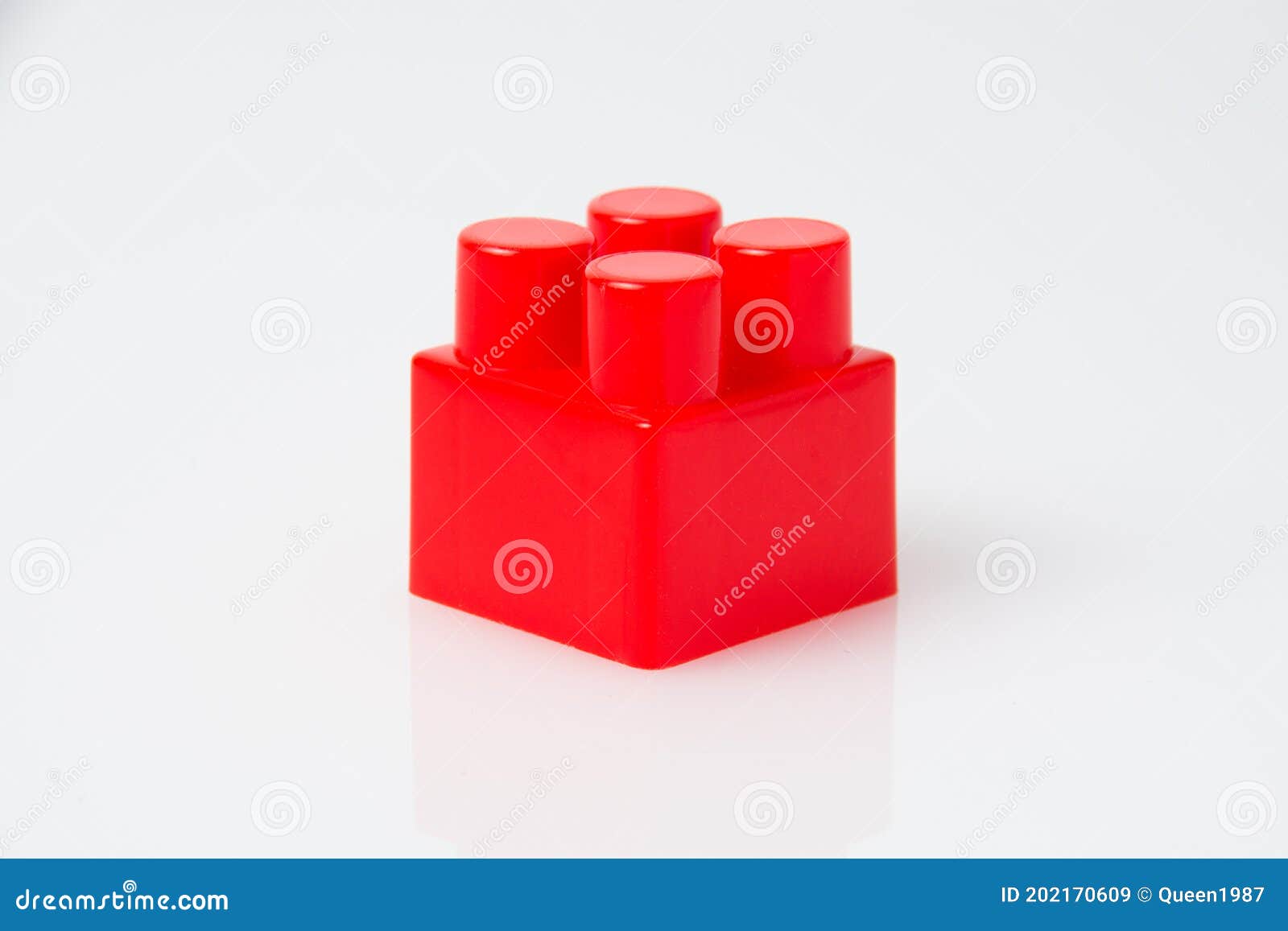 red cube block constructor on a white background with copy space. construction idea concept