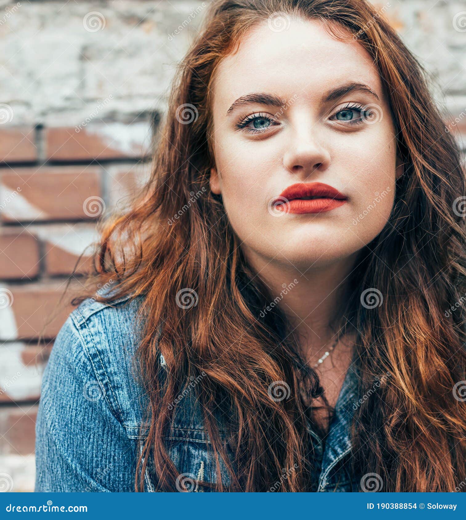 Red Curled Hair Caucasian Teen Girl With Applied Red