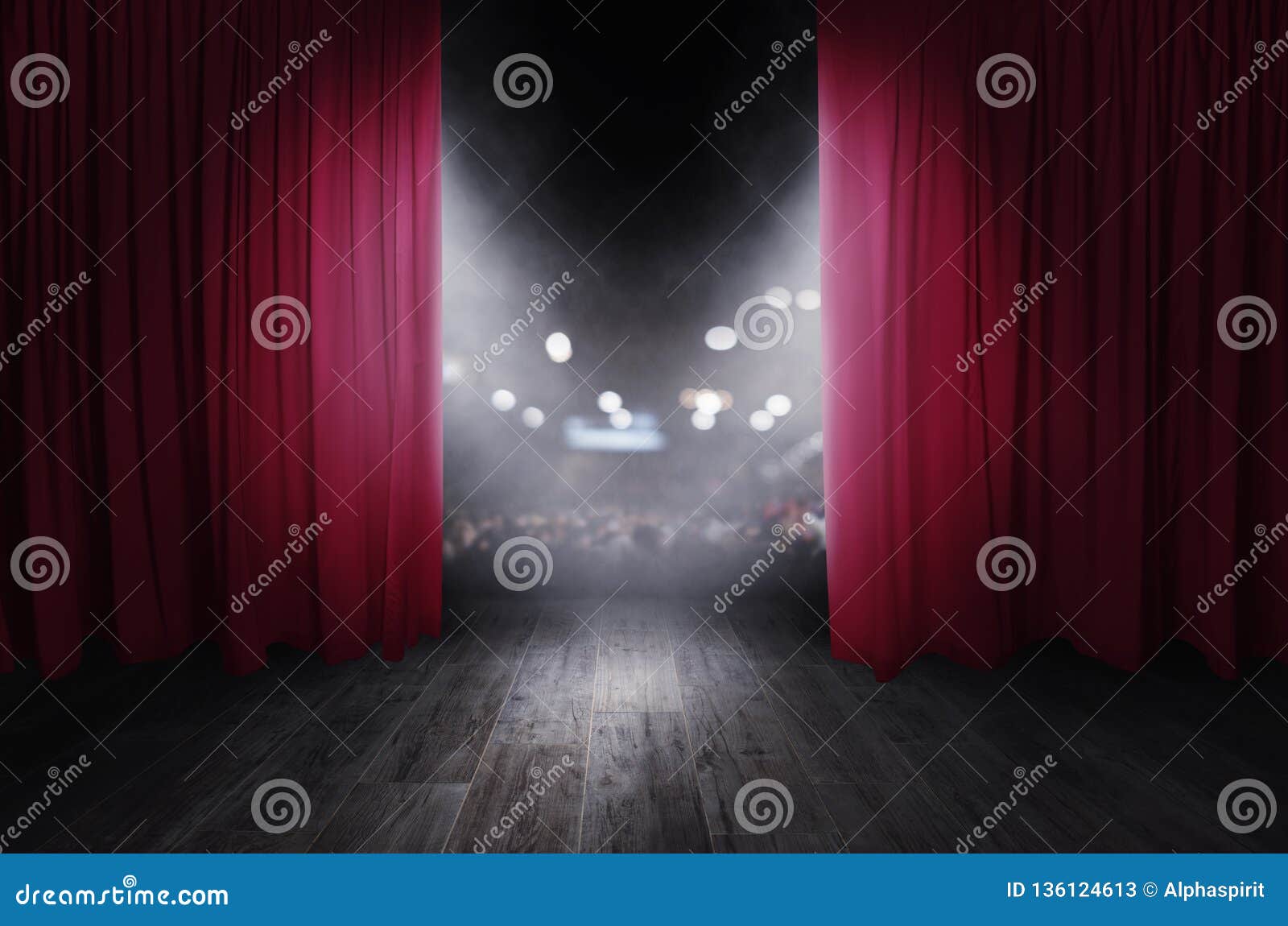 the red curtains are opening for the theater show