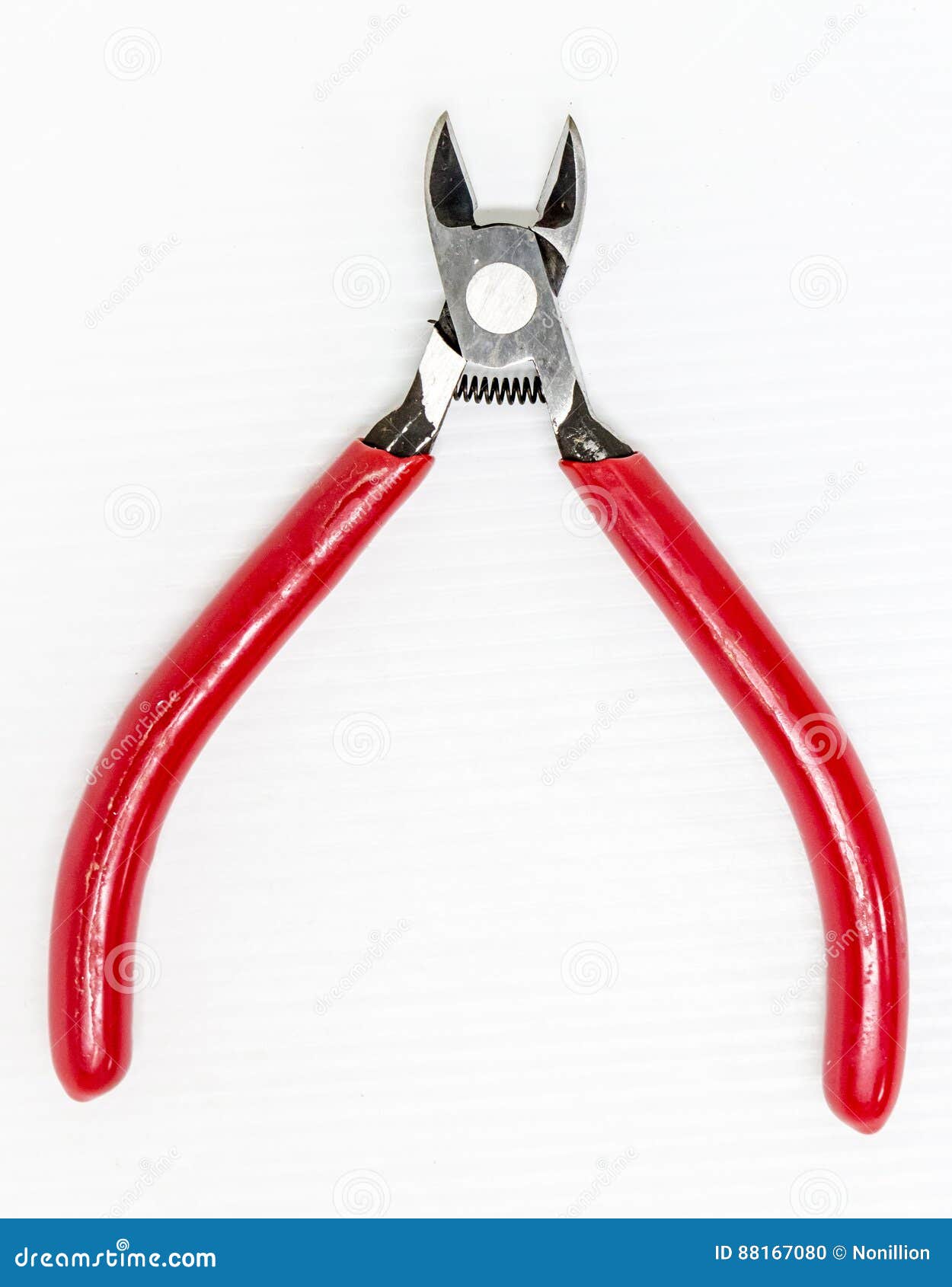 Red cutting plier on white stock photo. Image of scissors 88167080
