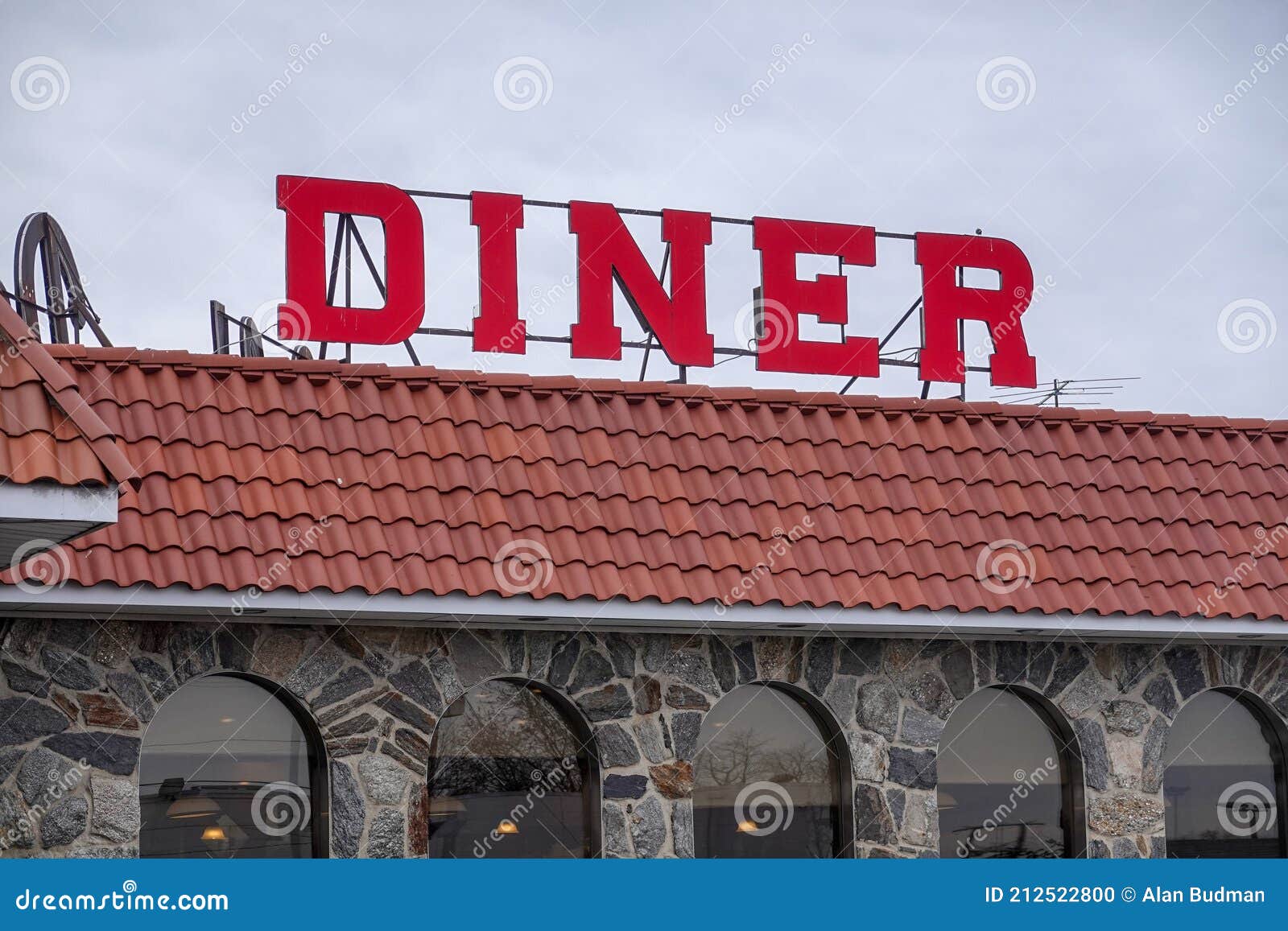 Red Diner Sign on the Tile Roof of a Building Stock Photo Image of restaurant, clay 212522800