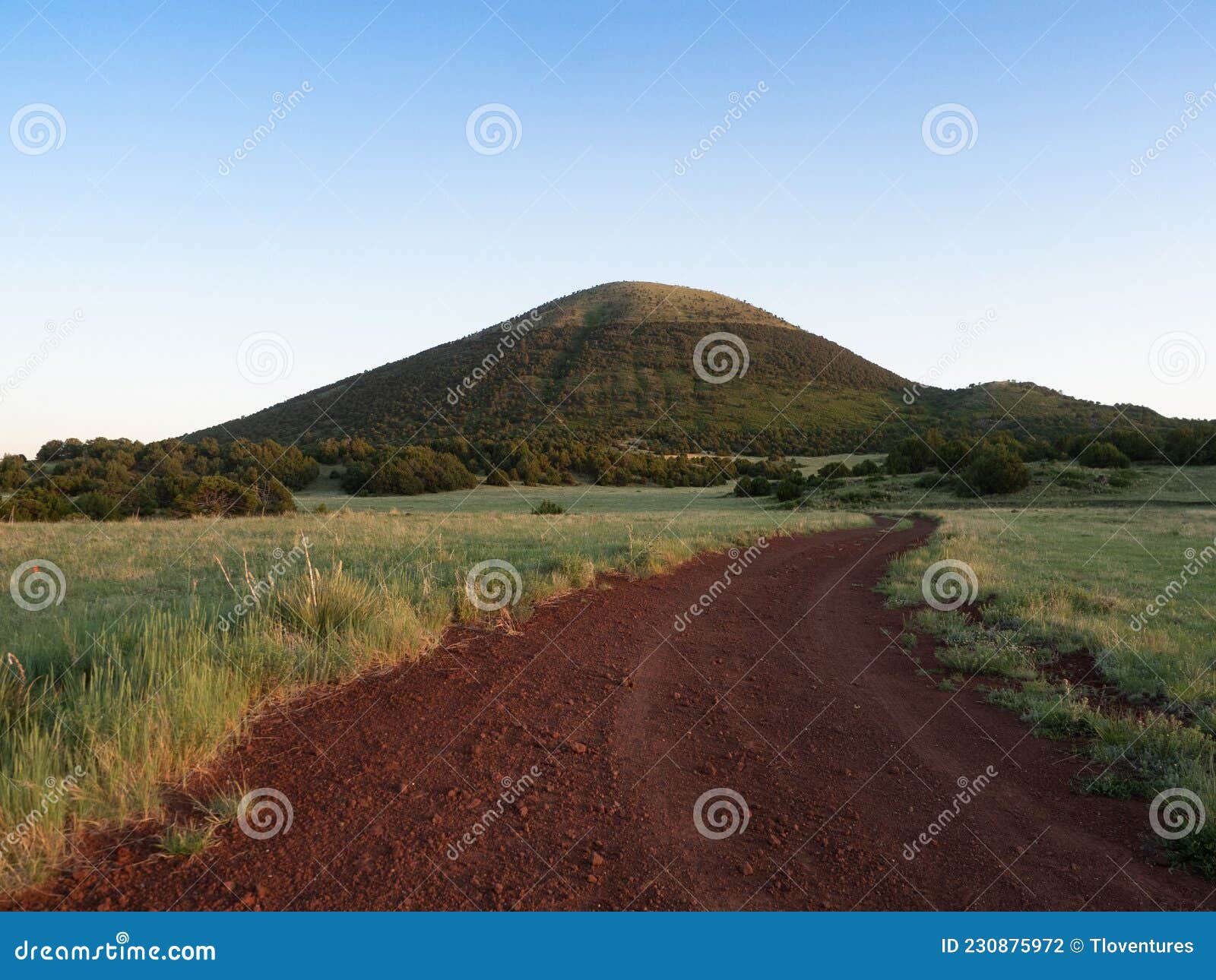 a red dirt road leading to capulin volcano in new mexico