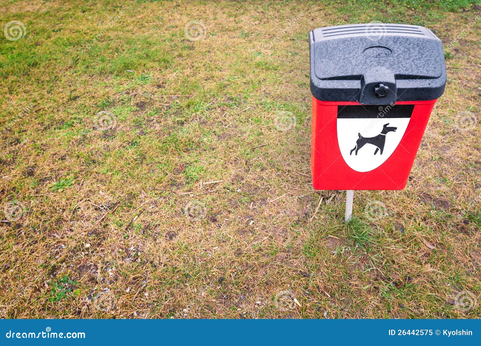 Red Dog Waste Bin on Green Lawn in Park Area. Stock Image Image of