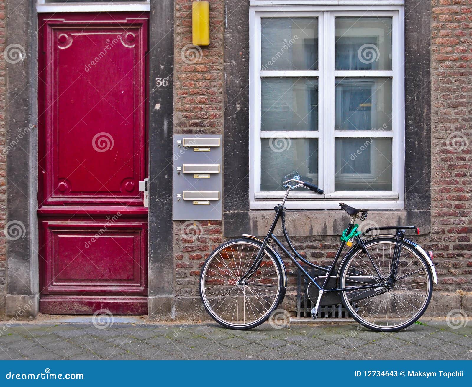 Red door and bicycle stock image. Image of black, speed - 12734643