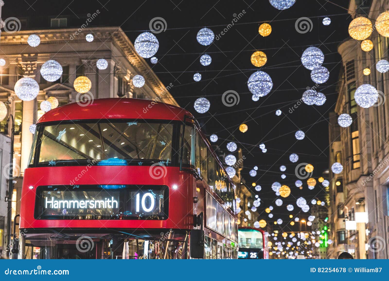 red double decker bus in london during christmas time
