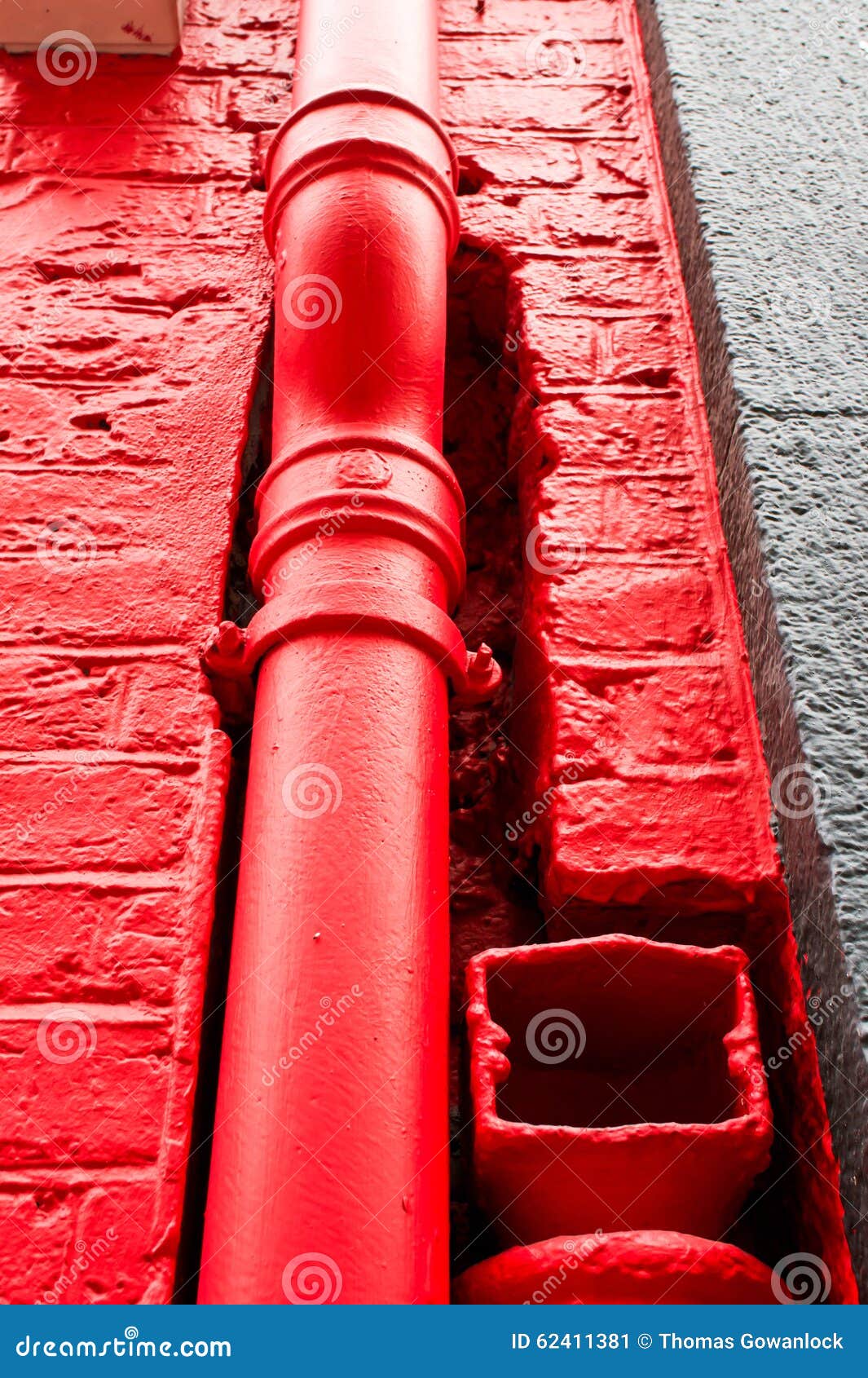 Red drainpipe stock image. Image of textured, grunge 62411381
