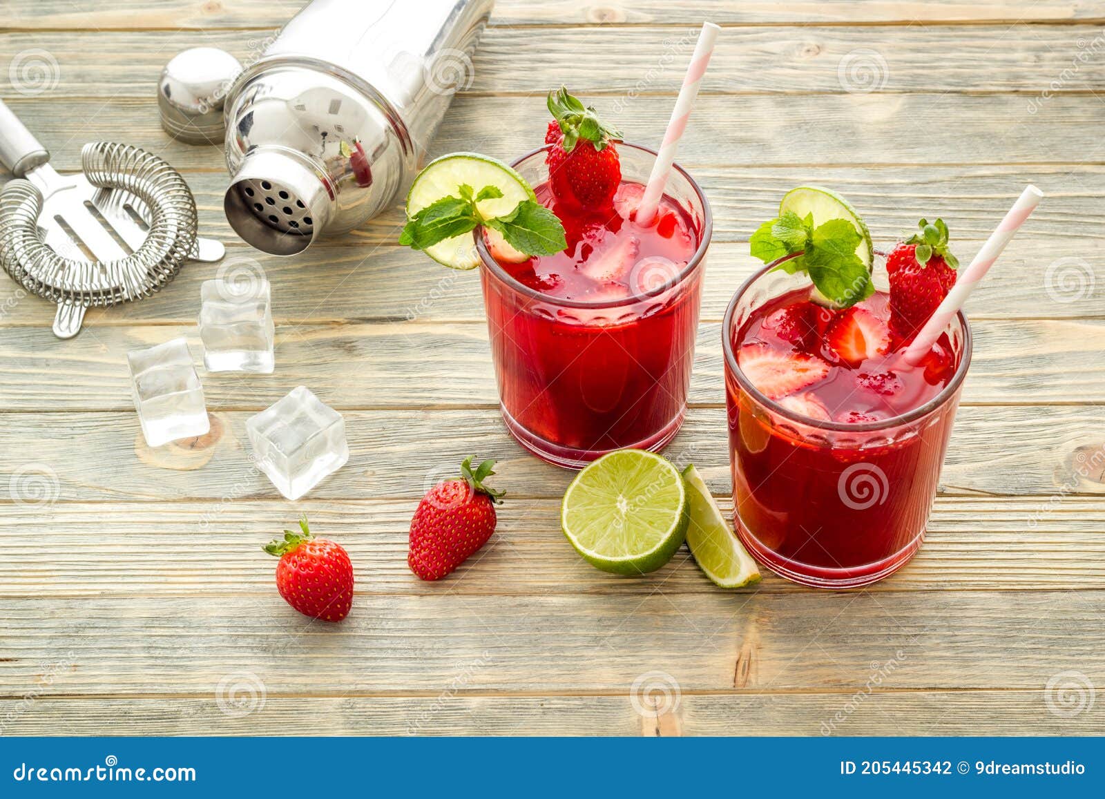 Red Drink Coktail with Strawberry, Ice and Mint. Cocktail Making Bar