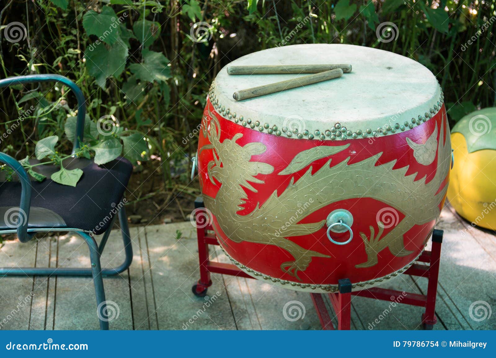 Red Drum with Asian Motifs on the Base. Stock Photo Image of faith