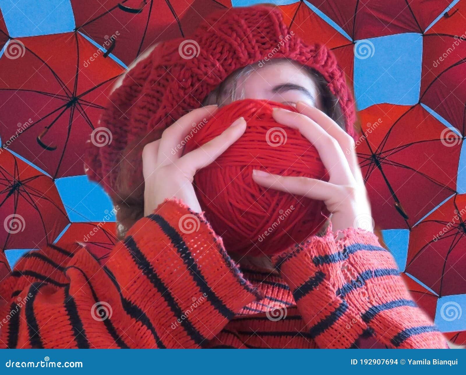 red elf among red umbrellas background