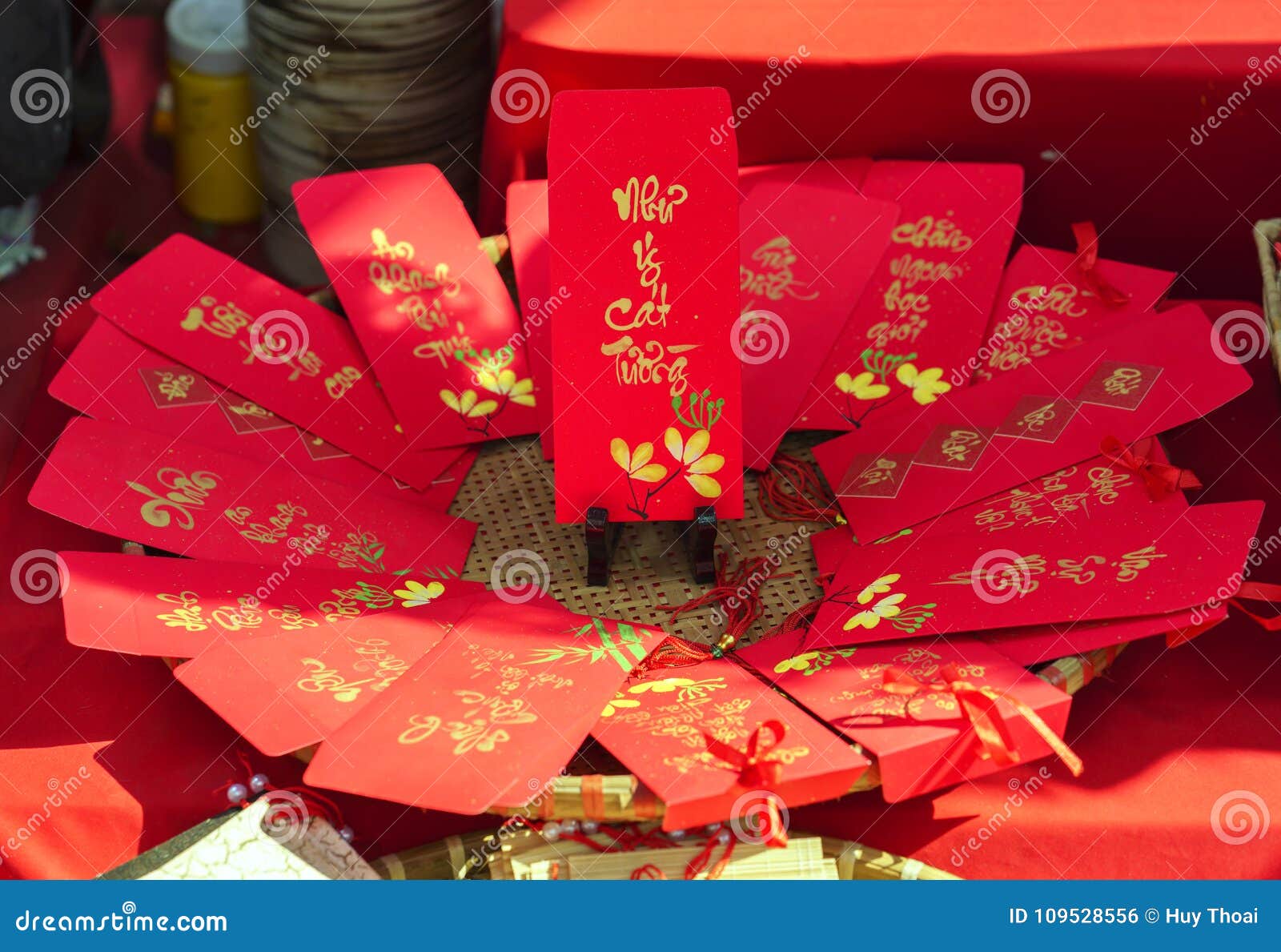 Close-up Of Vietnamese Red Envelopes With Money Being Presented On