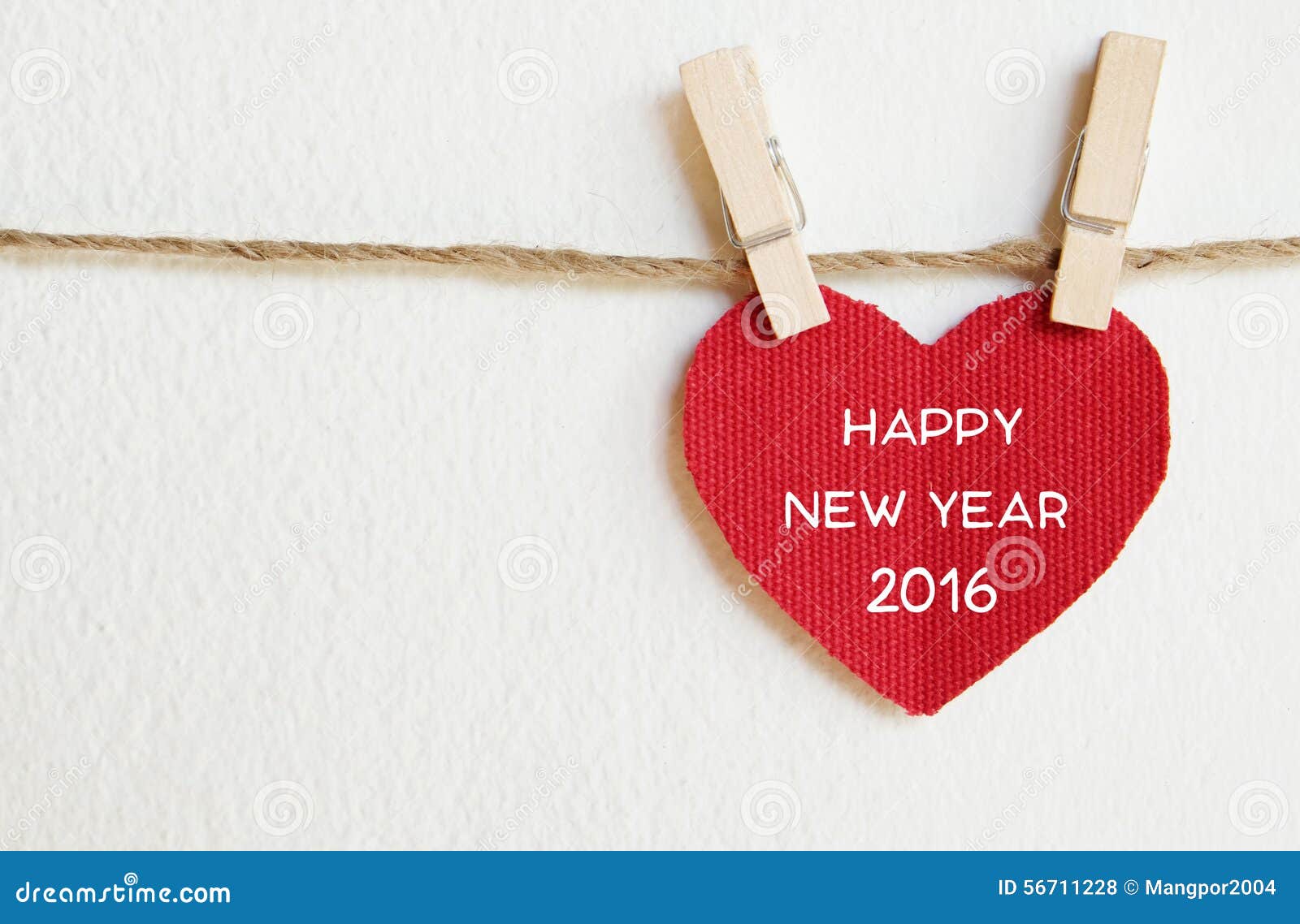 Red Fabric Heart With Happy New Year 2016 Word Hanging On The Cl Stock red-fabric-heart-with-happy-new-year-2016-word-hanging-on-the-cl-stock