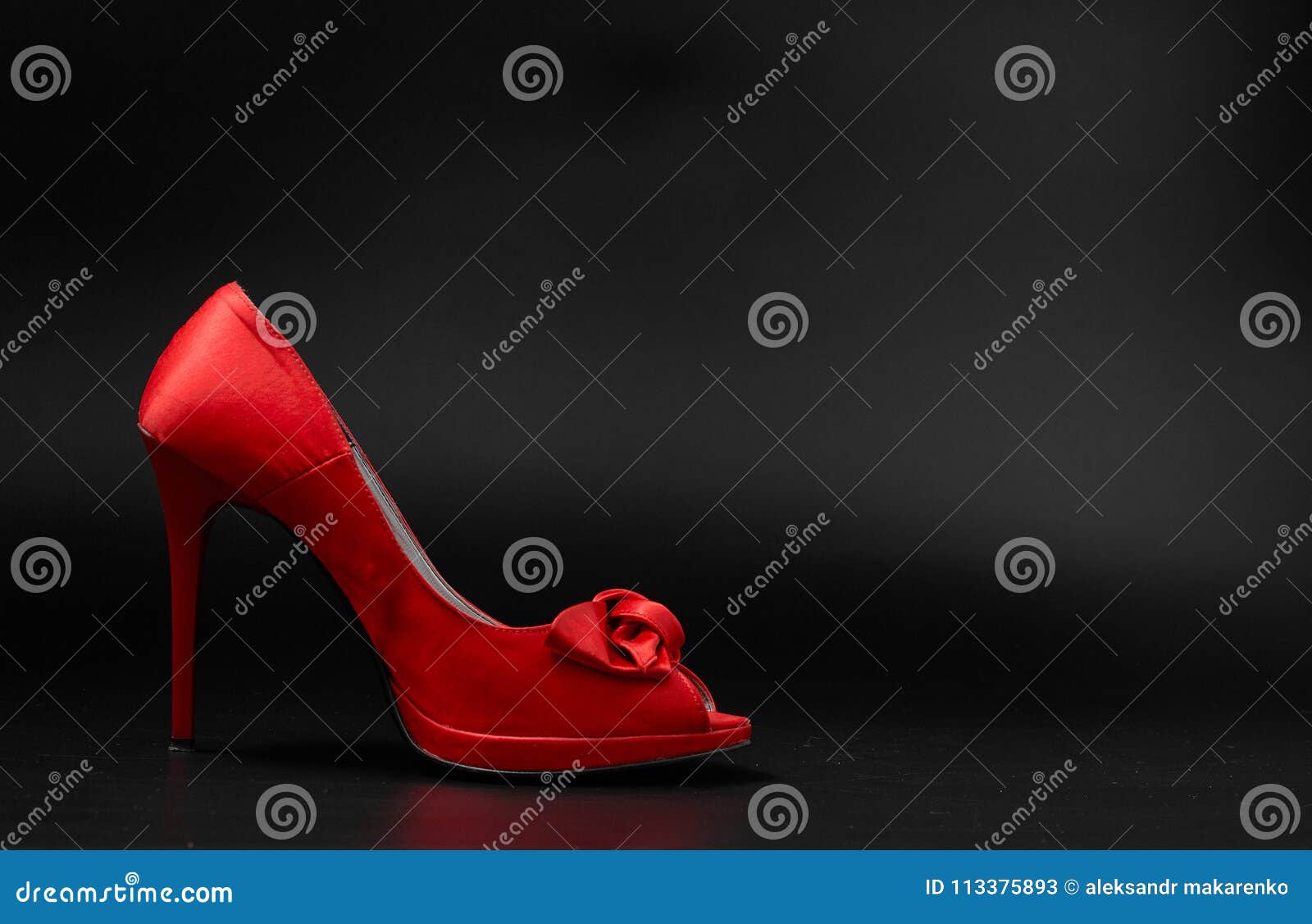 Red Fashion Women Shoes on a Black Background. Stock Image - Image of