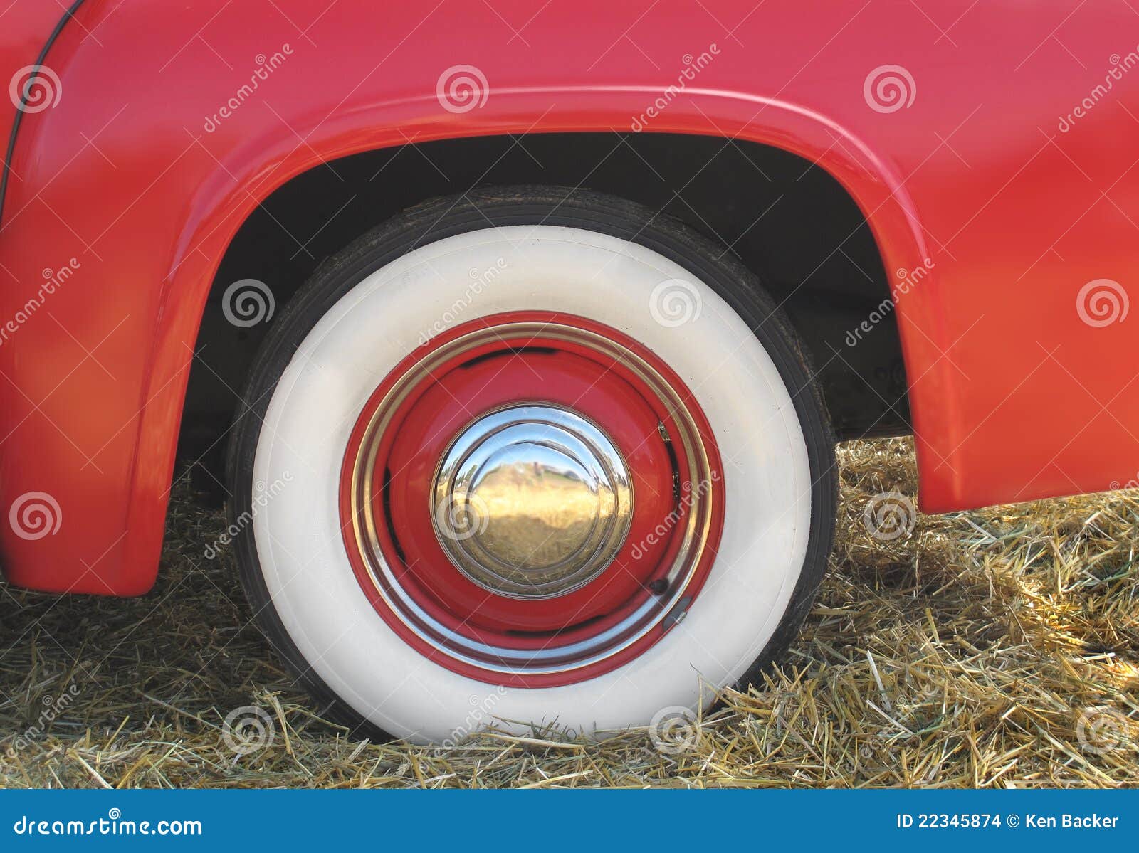 Closeup Of Whitewall Tires, Fender And Hubcap On Old Vintage Car With