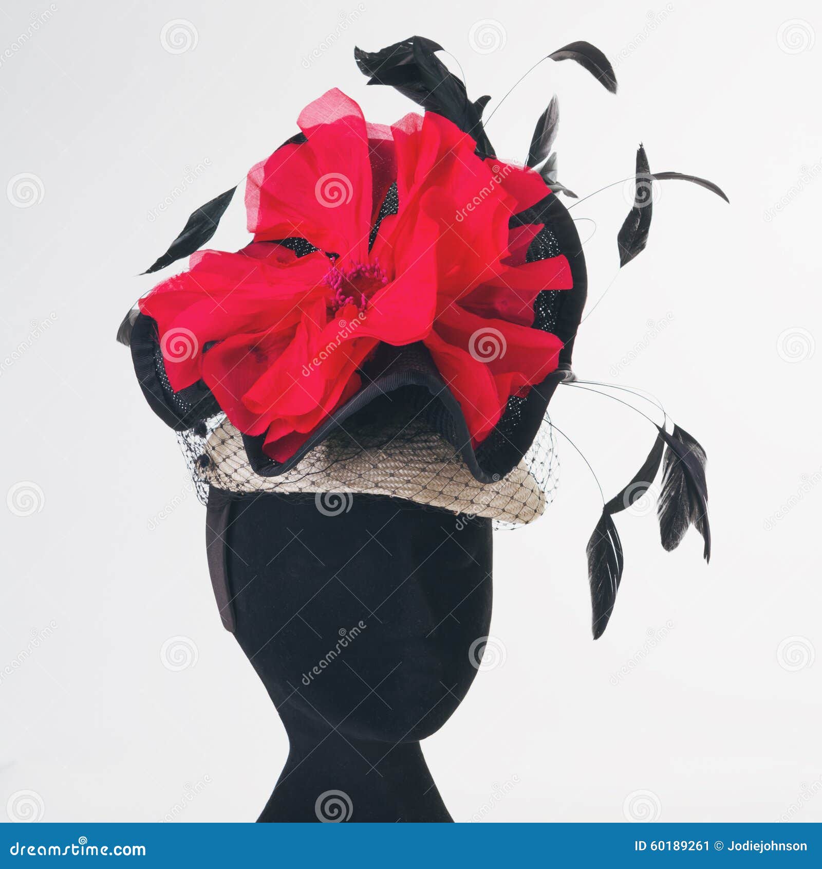 red flower and black feathers races hat
