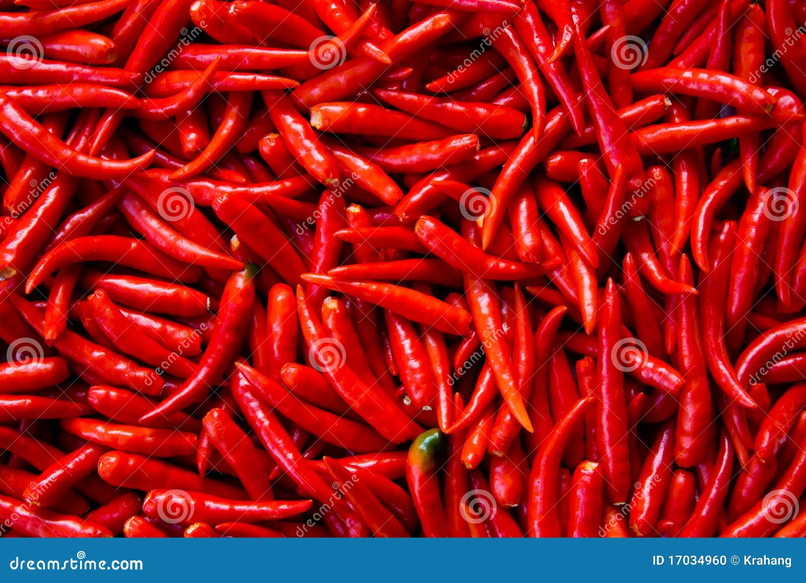 Fresh Red Chilli Pepper And Sections Of Chilli Pepper Floating Over