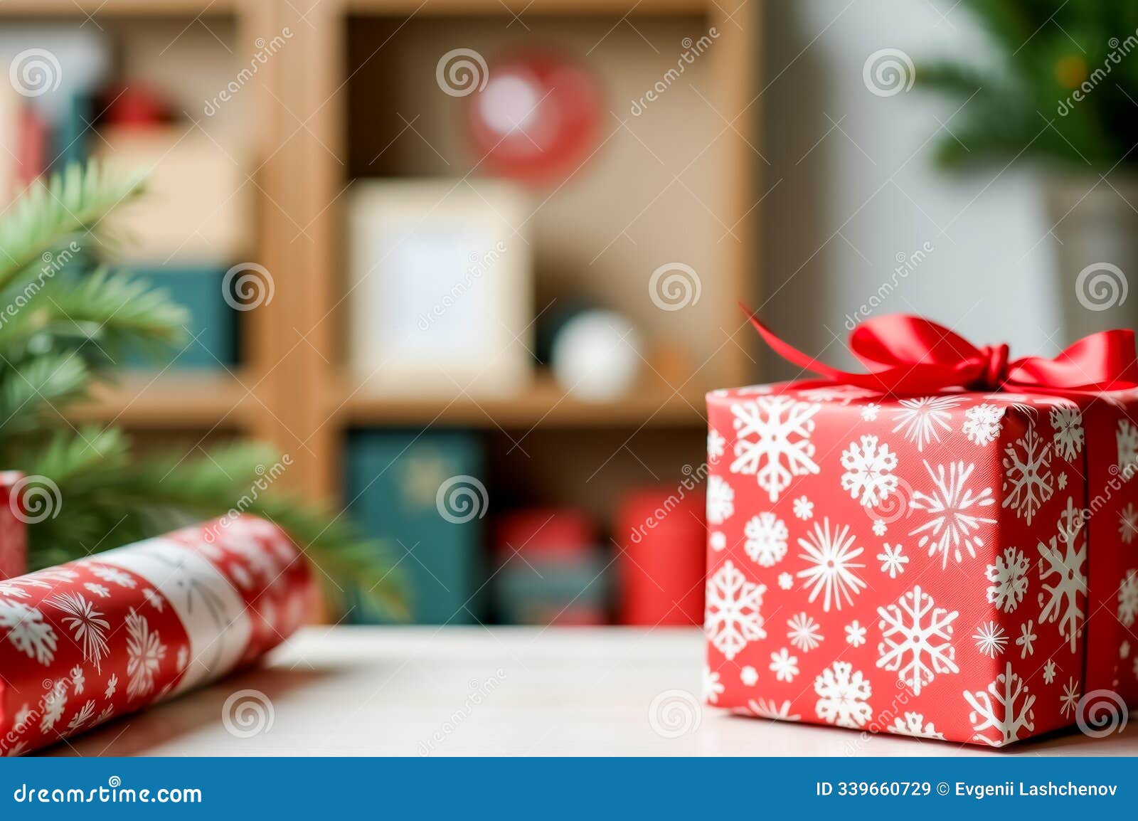 red gift box with snowflake wrapping paper and ribbon on festive table. ai generation
