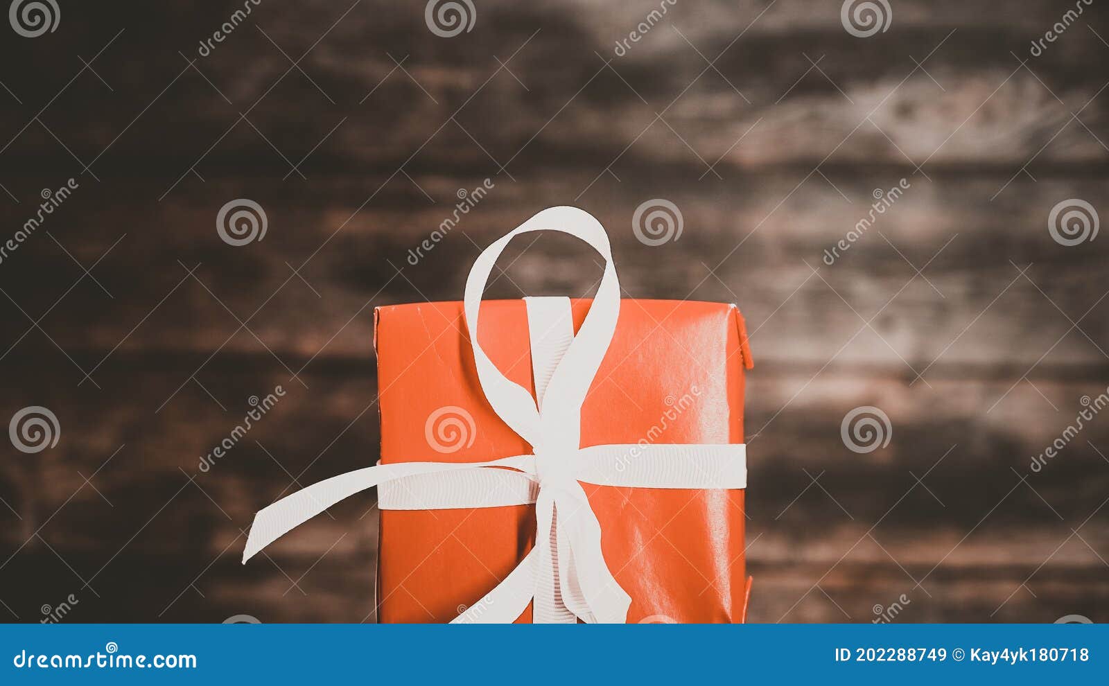 Red Gift Wrap on Black Background Stock Image - Image of romance, decor