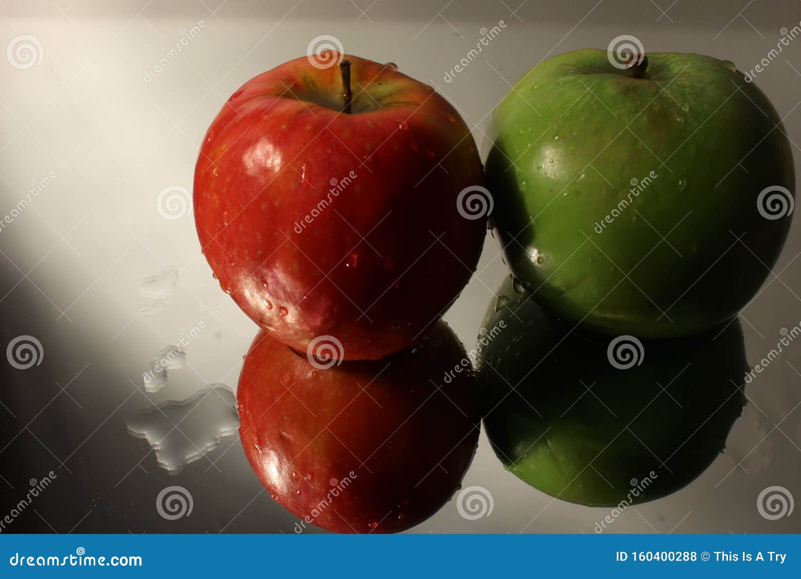 two reflected apples & water with applying rule of thirds