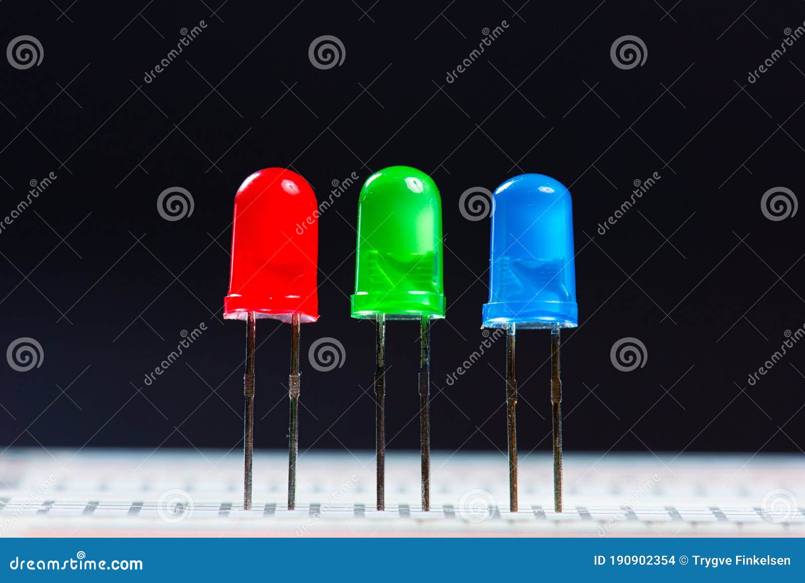 Red , Green and Blue LED Diodes Against a Dark Background Stock Photo