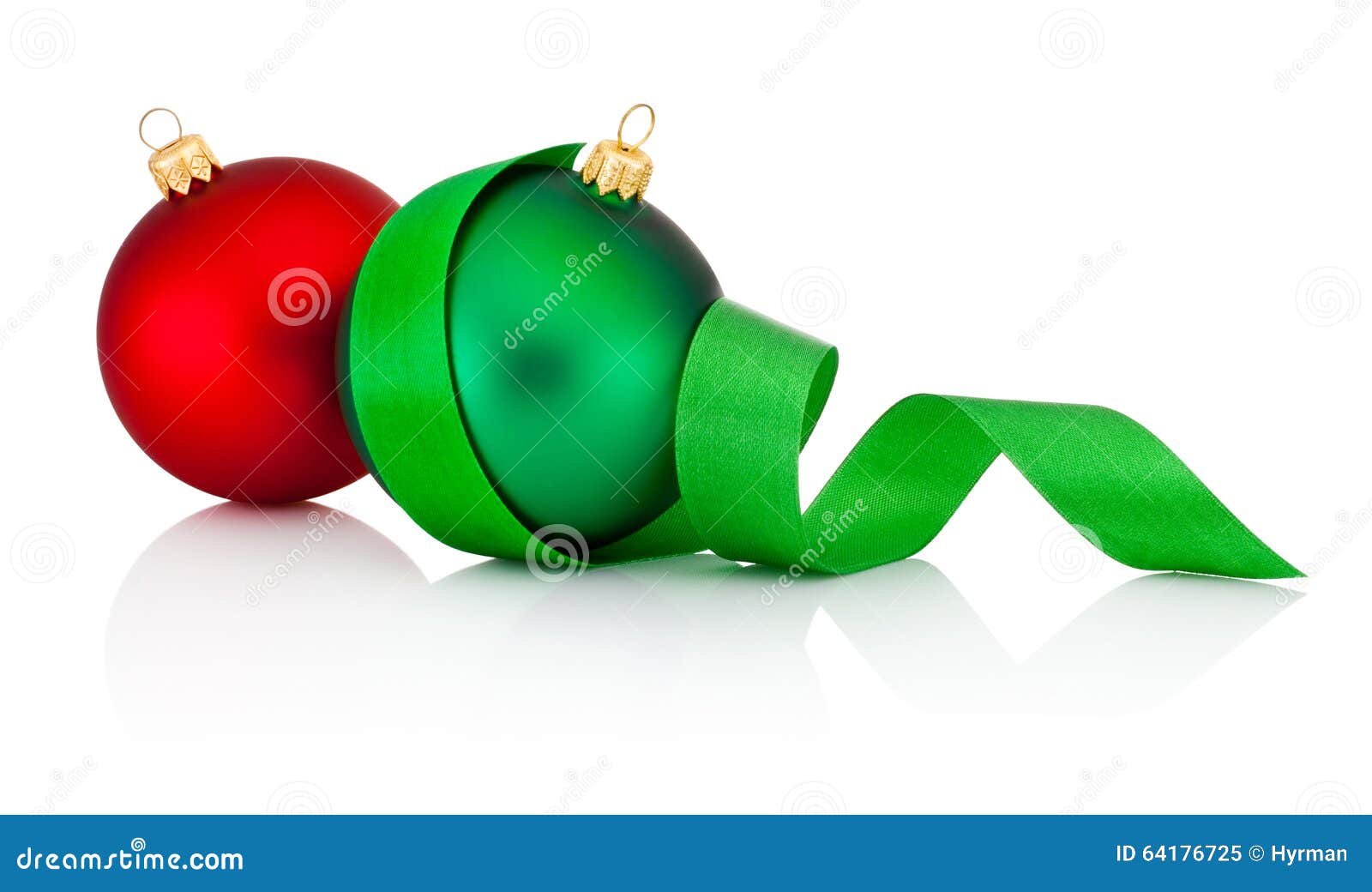 red and green christmas baubles with ribbon  on white