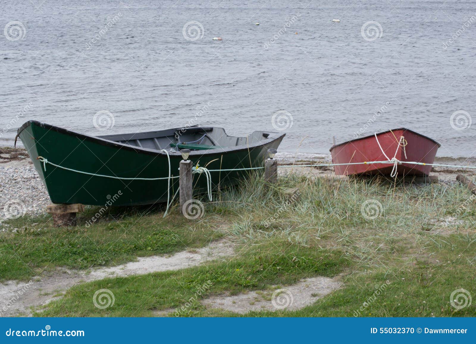 Red And Green Fishing Boats Tied Off With Rope Stock Photo 