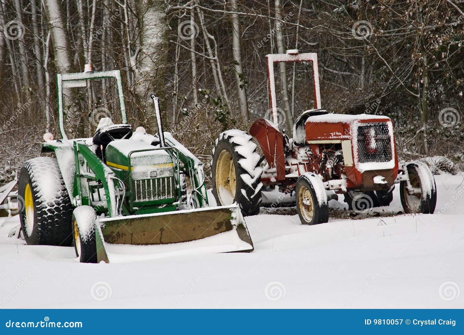 Red and Green Tractors Dusted with Snow Editorial Photography Image