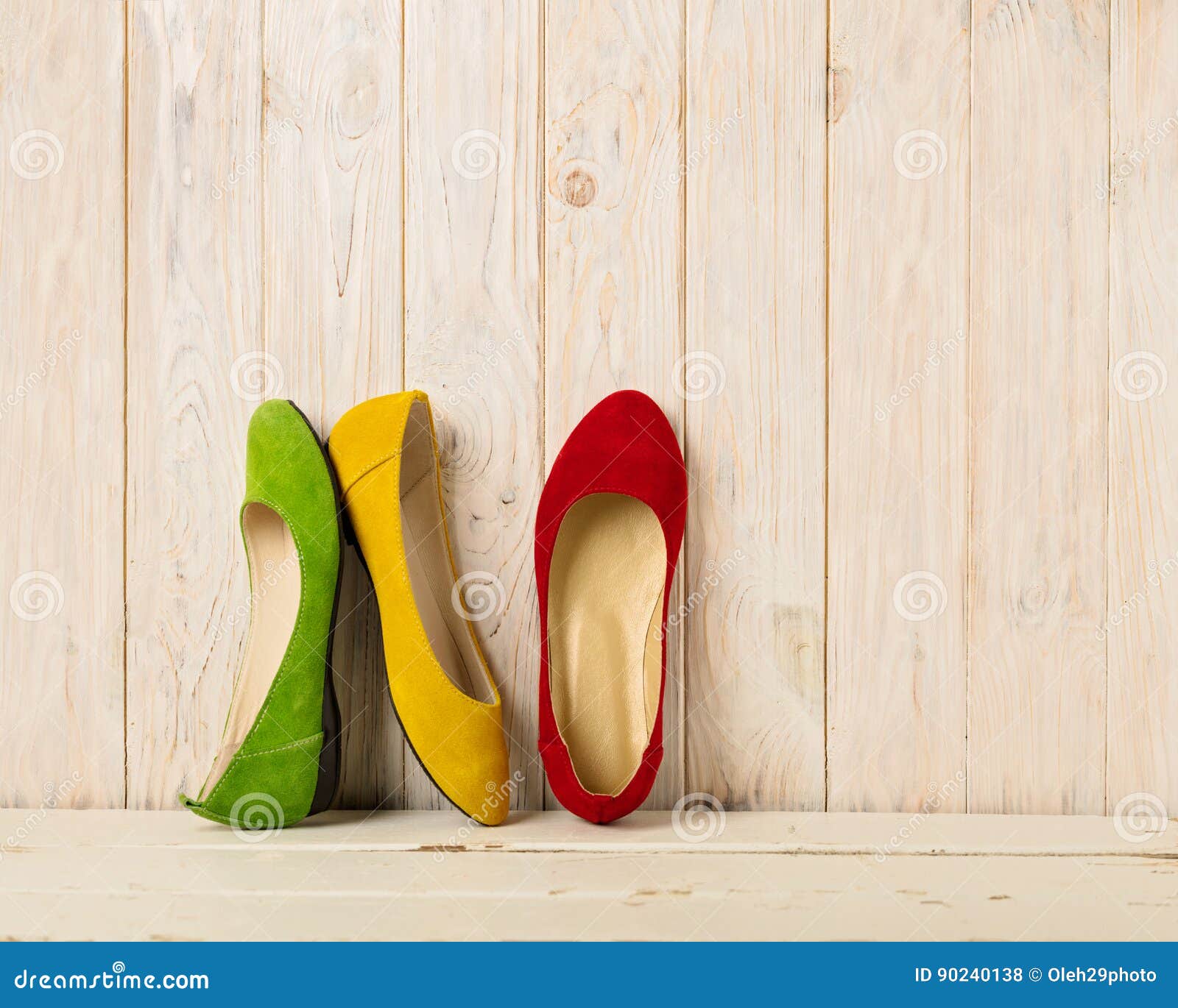 Red, Green and Yellow Women`s Shoes Ballerinas on Wooden Backg Stock ...