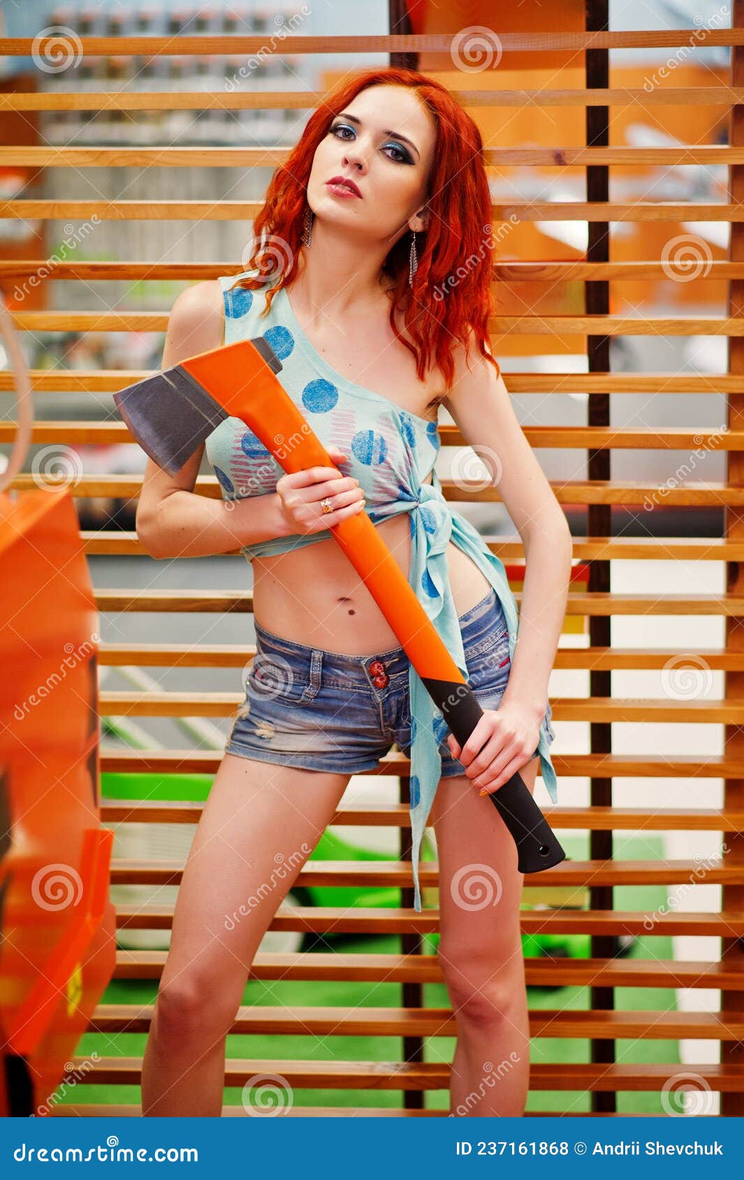 red haired model posed at store or household shop