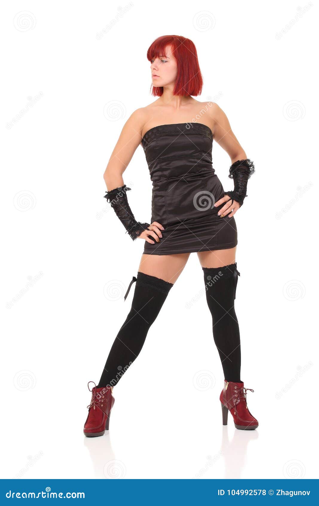 Red-haired woman in black. stock photo. Image of length - 104992578