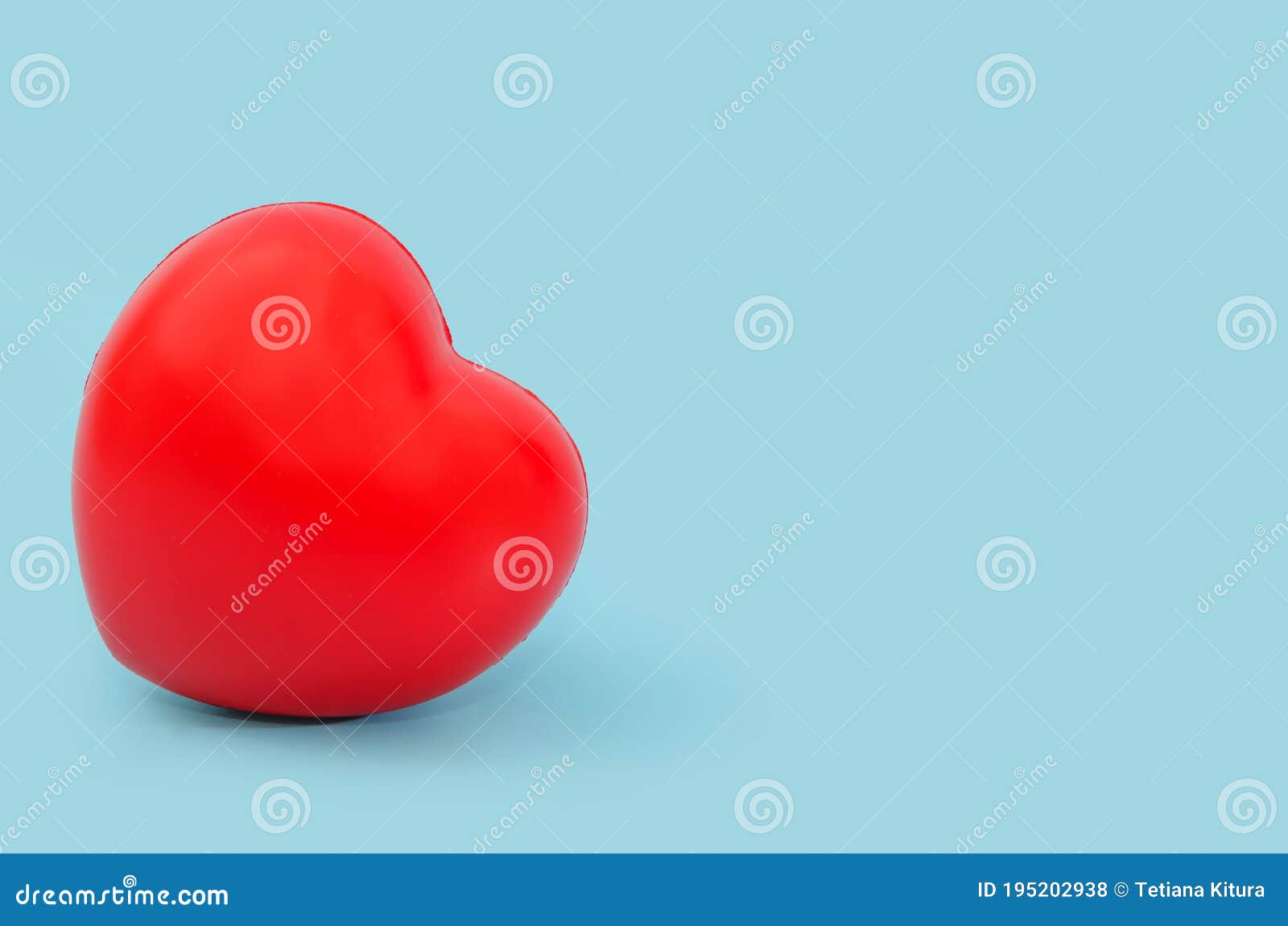 Red Heart on a Blue Background. Copy of Space. Stock Photo Image of background, beautiful