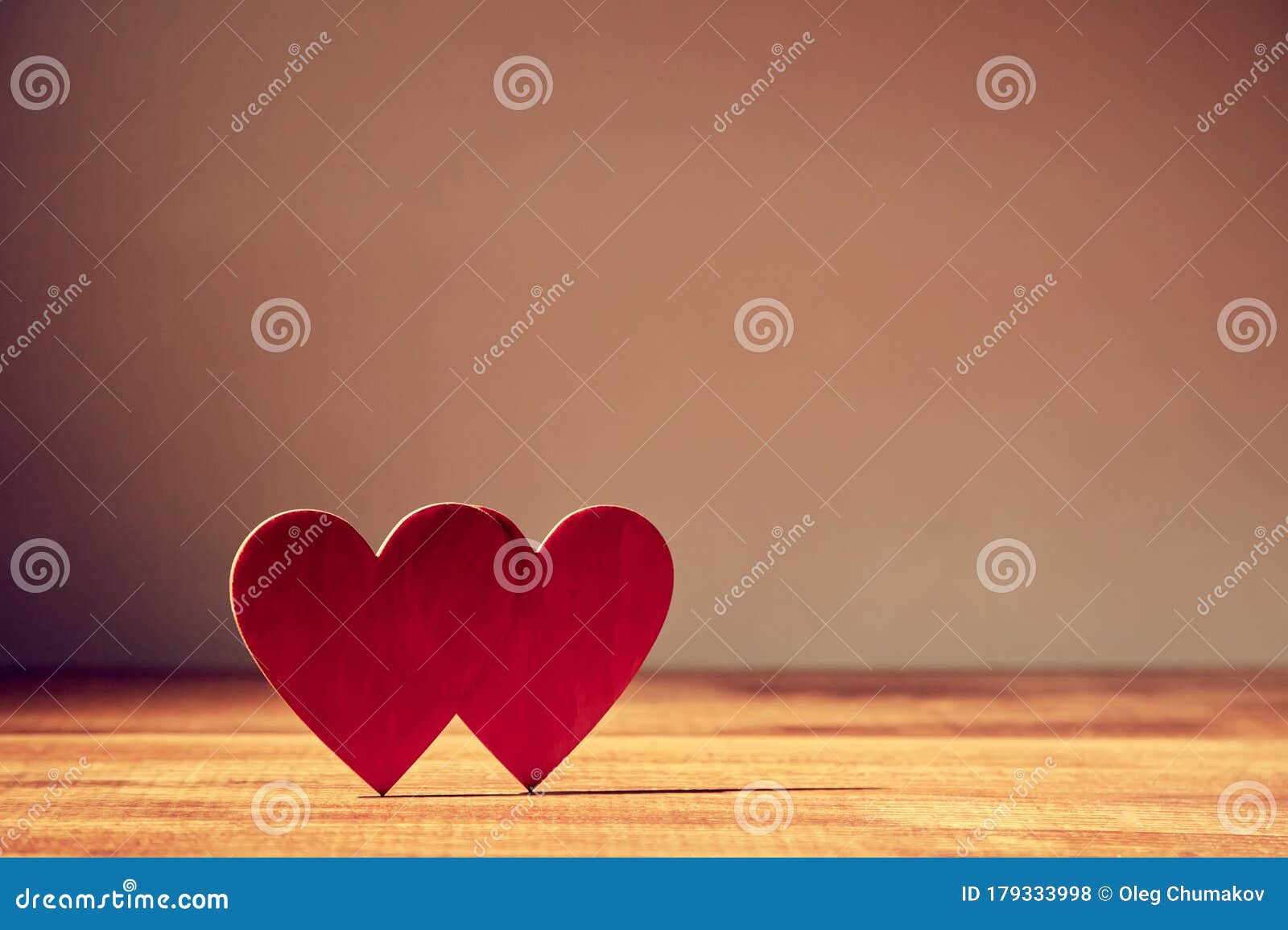 red hearts mockup on wooden surface, copy space. couple in love. saint valentines day. sweethearts. amour and fondness