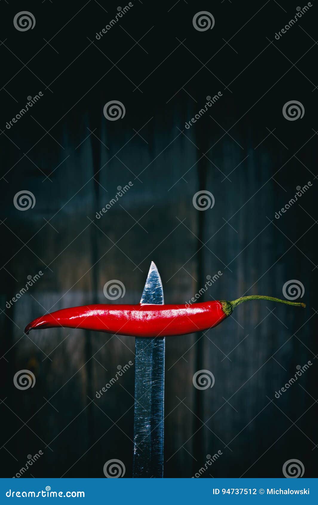 Red Hot Pepper on the Knife Blade Stock Photo Image of dark, wooden