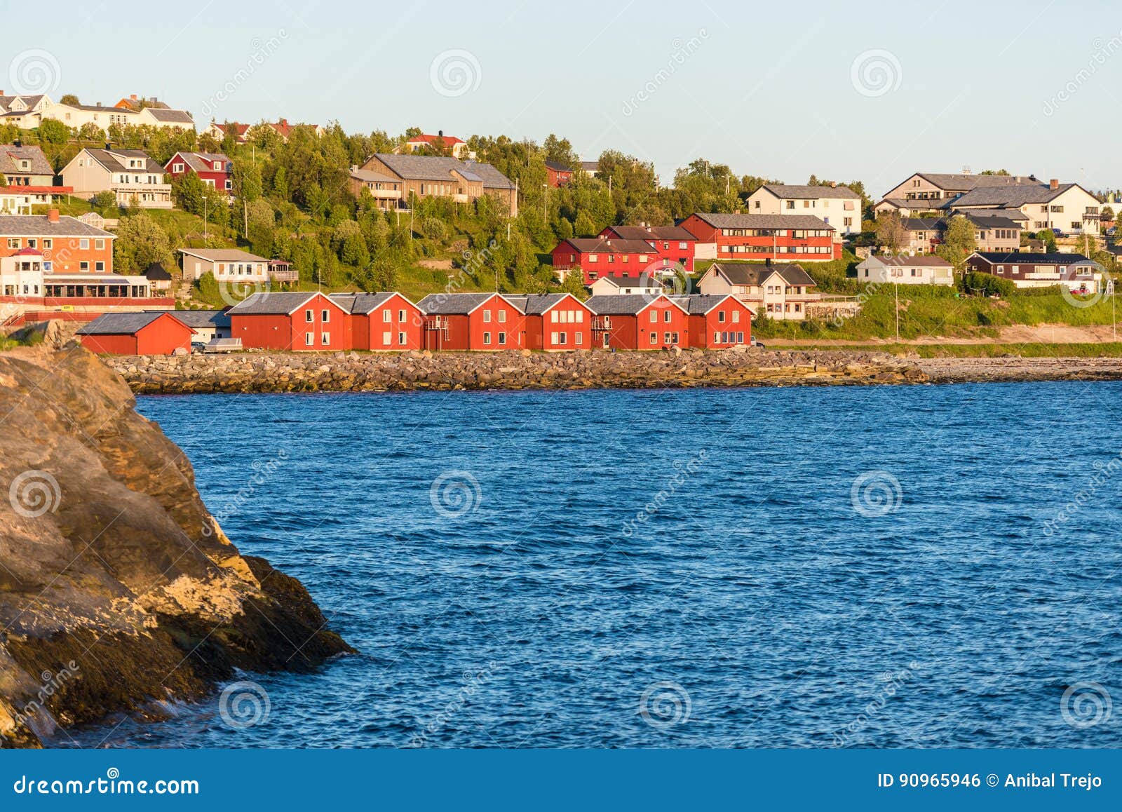 red houses on the bay of alta, norway