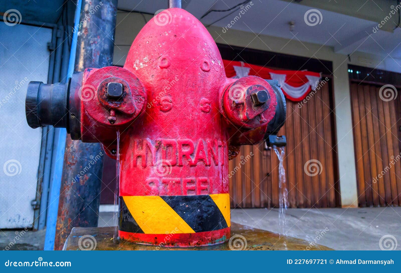 Red Hydrant Steel and Water Leaking from it Stock Image Image of
