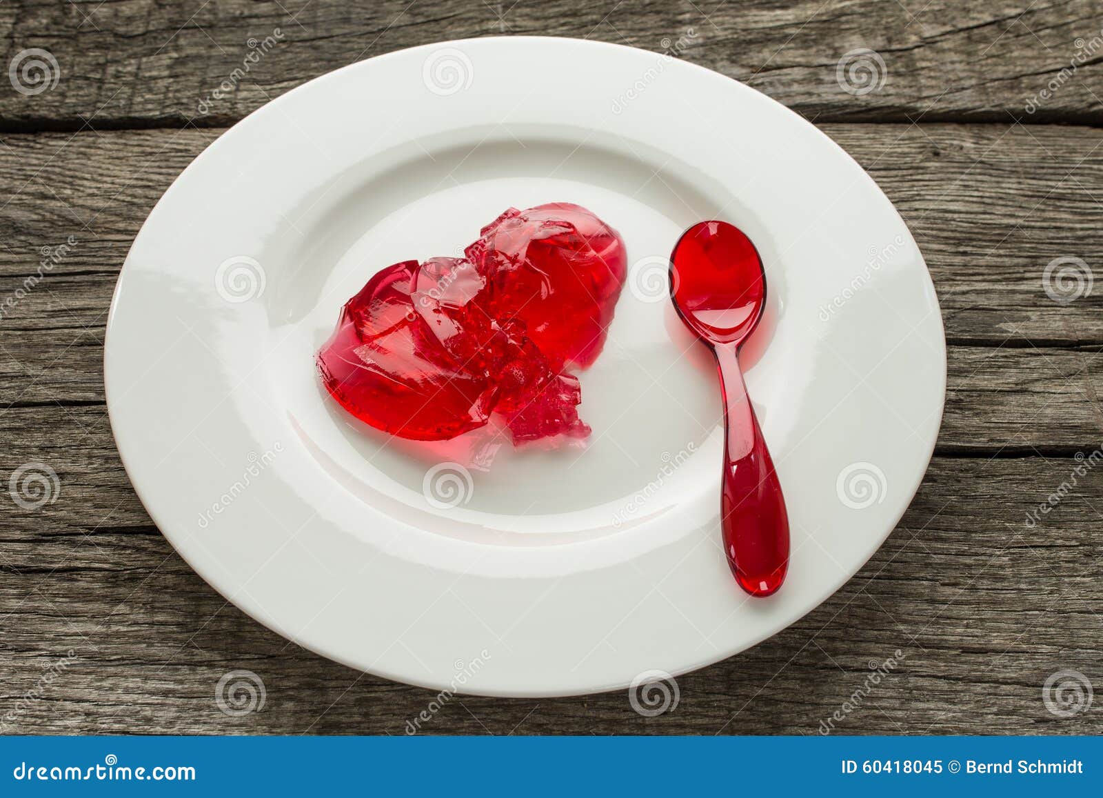Red jello with spoon stock image. Image of gelatin, dessert 60418045