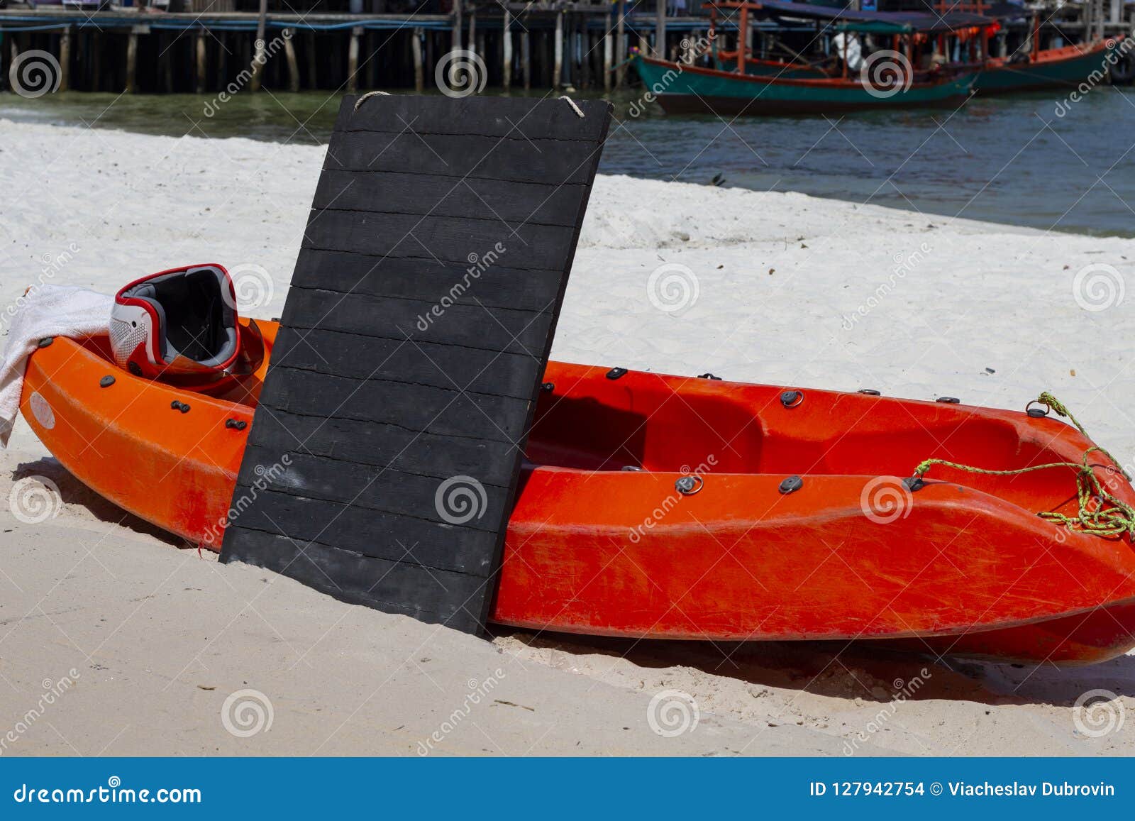 Red Kayak and Blank Billboard on Sunny Beach Photo. Black Board Outdoor ...