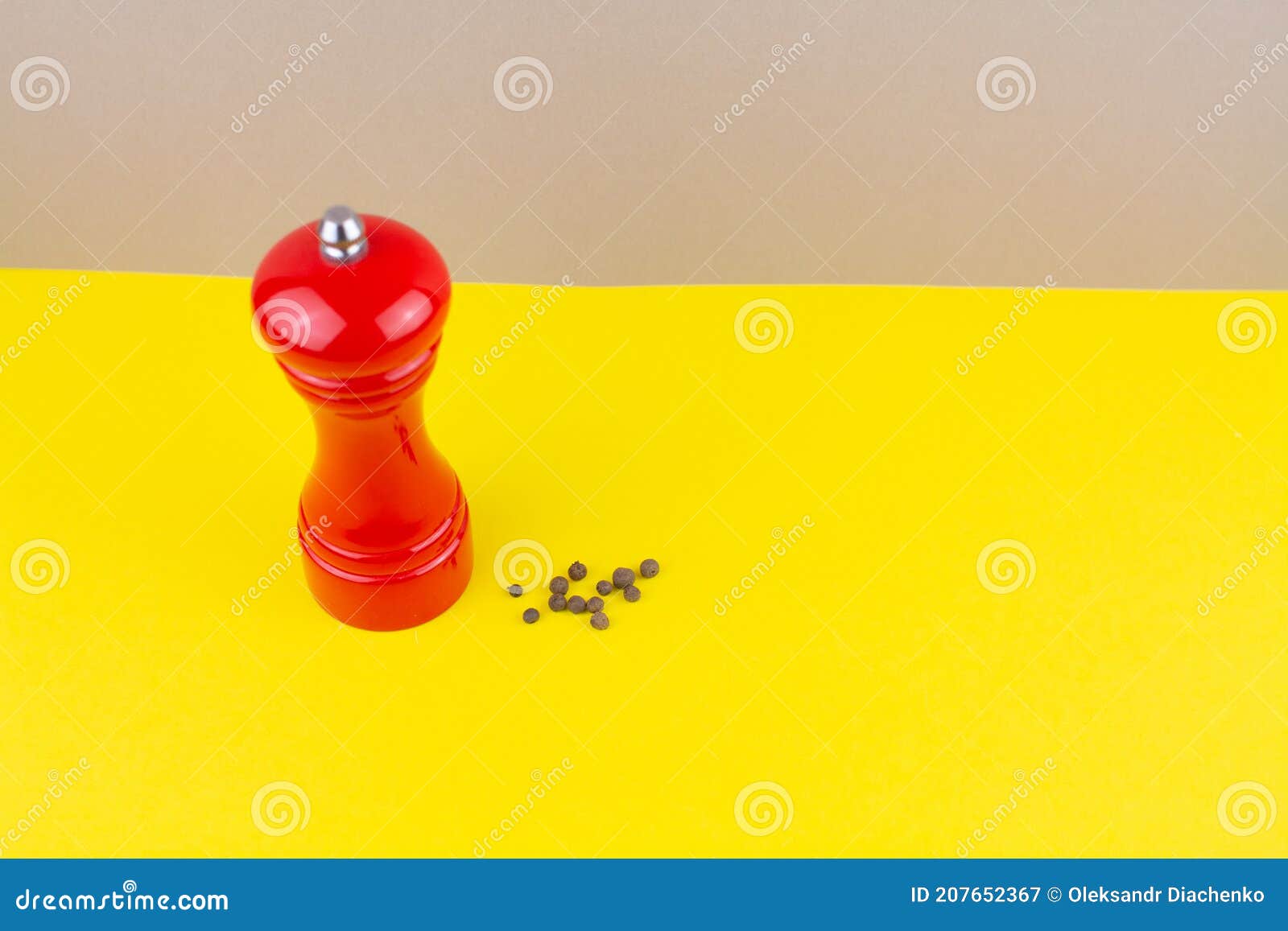 Red Kitchen Pepper Shaker for Ground Pepper on the Table Stock Image