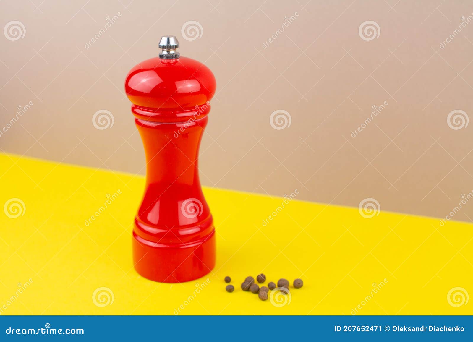 Red Kitchen Pepper Shaker for Ground Pepper on the Table Stock Image