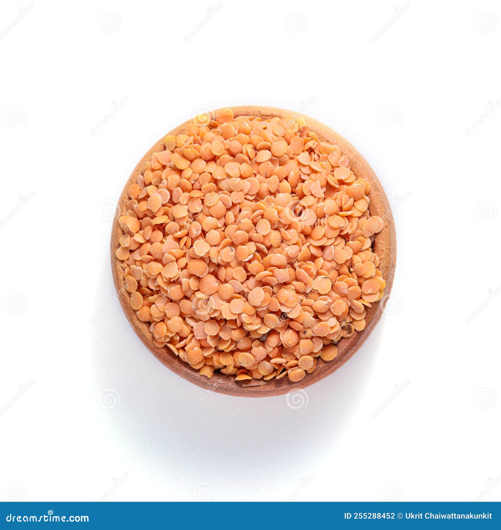 Red Lentils Red Masoor, Masoor Dal. Red Lentils in Pottery Stock Photo
