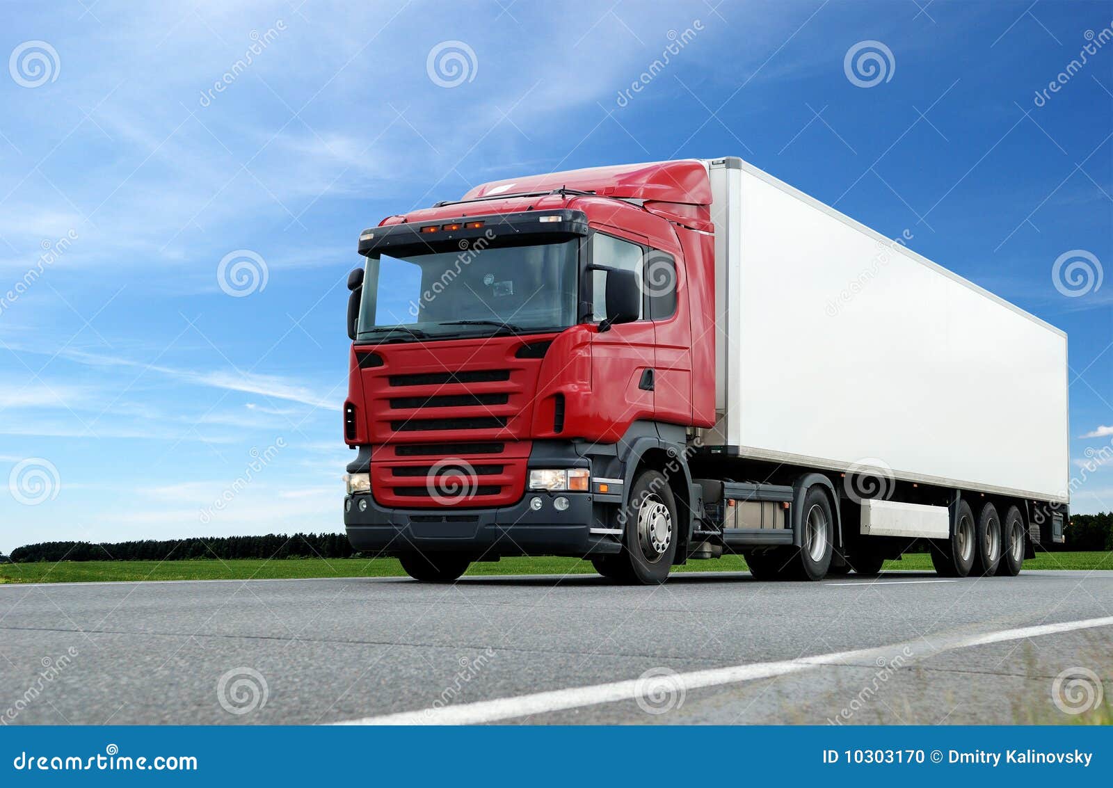red lorry with white trailer over blue sky