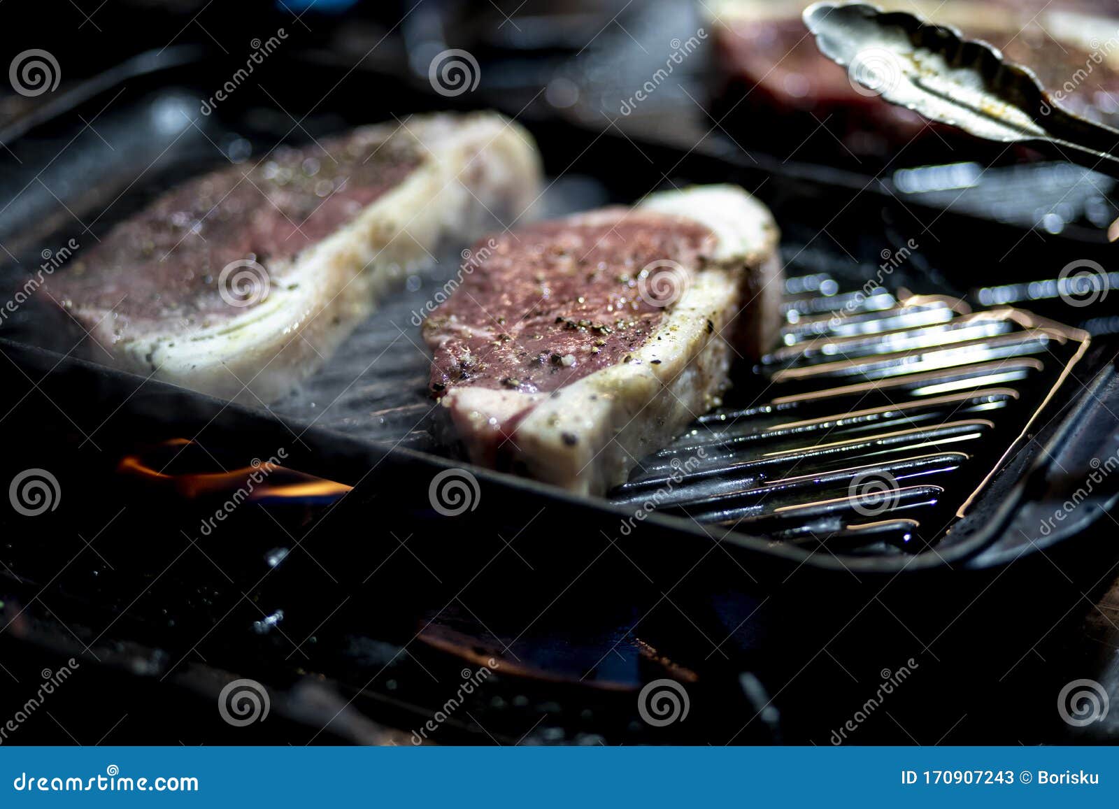 red meat preparetion on a grill