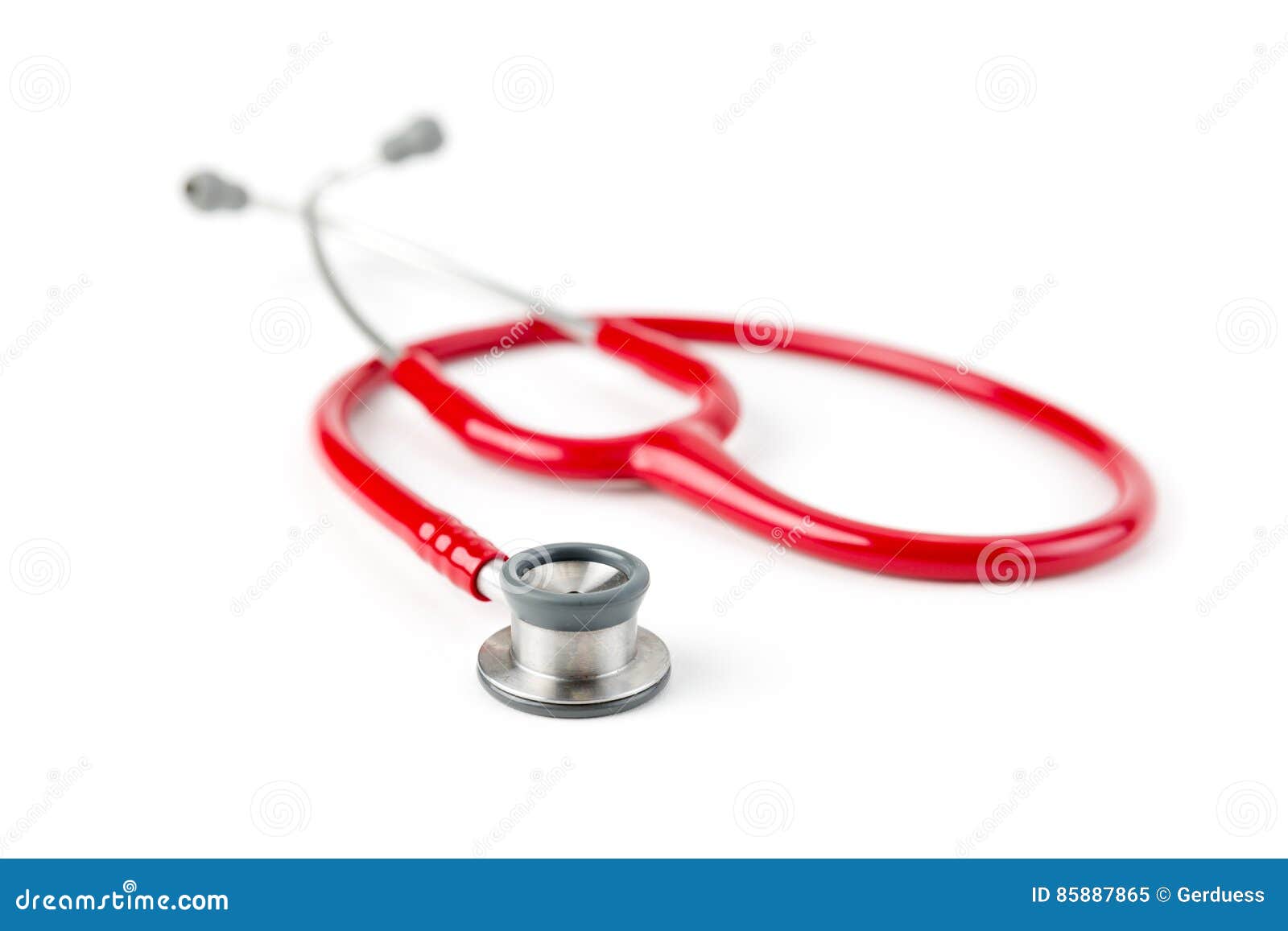 red medical stetoskop  on a white background. studio shot. front view. shallow depth of field.