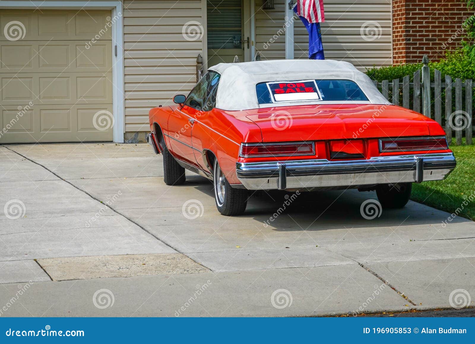 Red Old Historic Car Parked In A Driveway With A White Convertible Roof