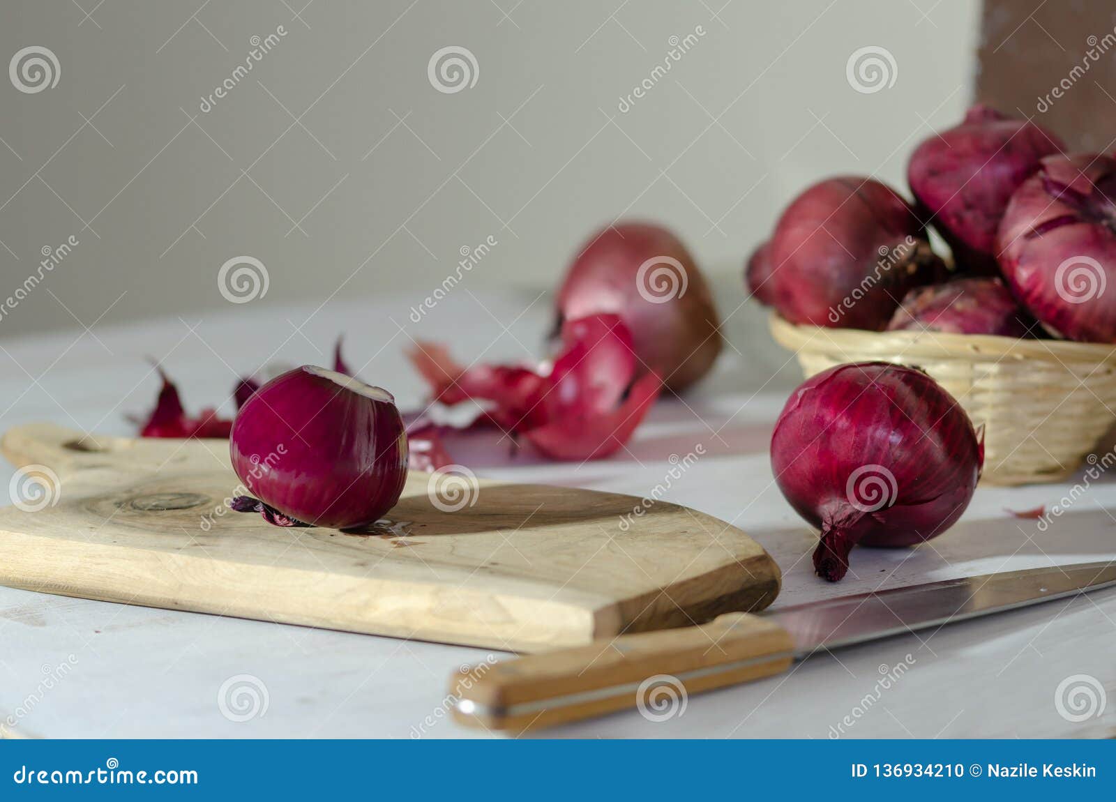 Red onions in the kitchen. stock photo. Image of group - 136934210