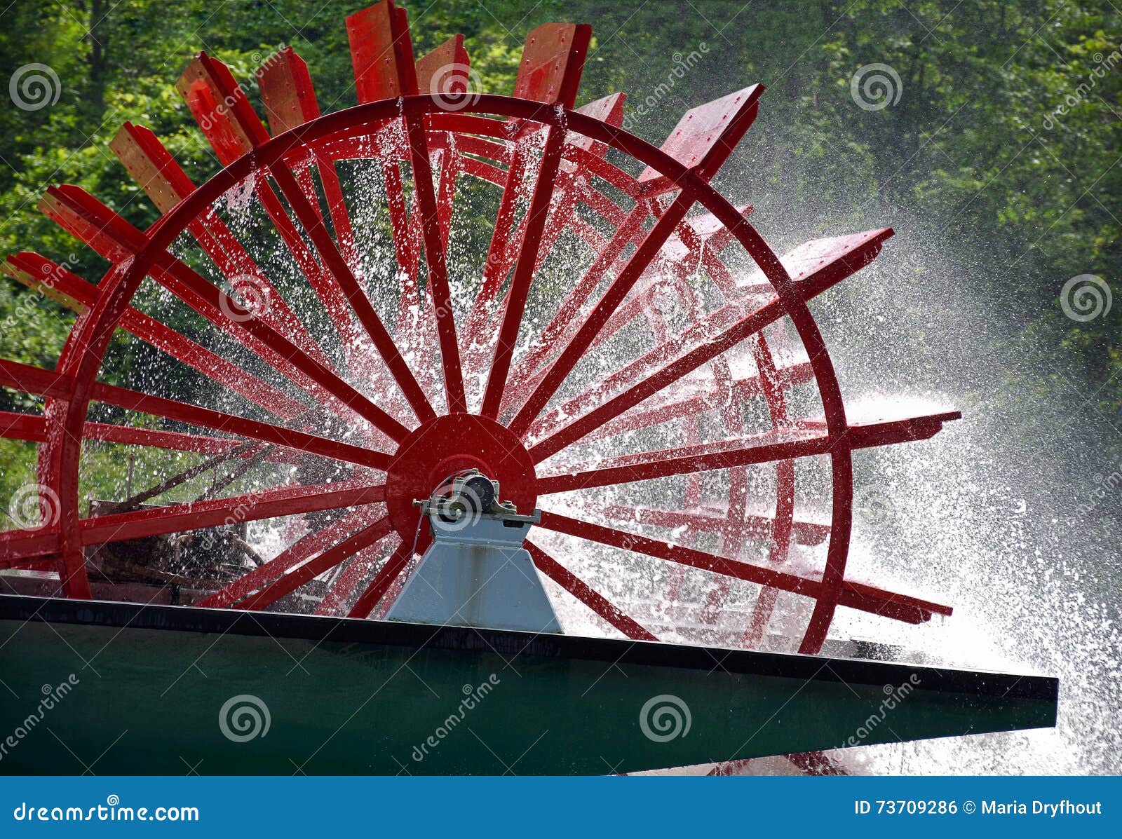 red paddle wheel on river boat stock photo - image of