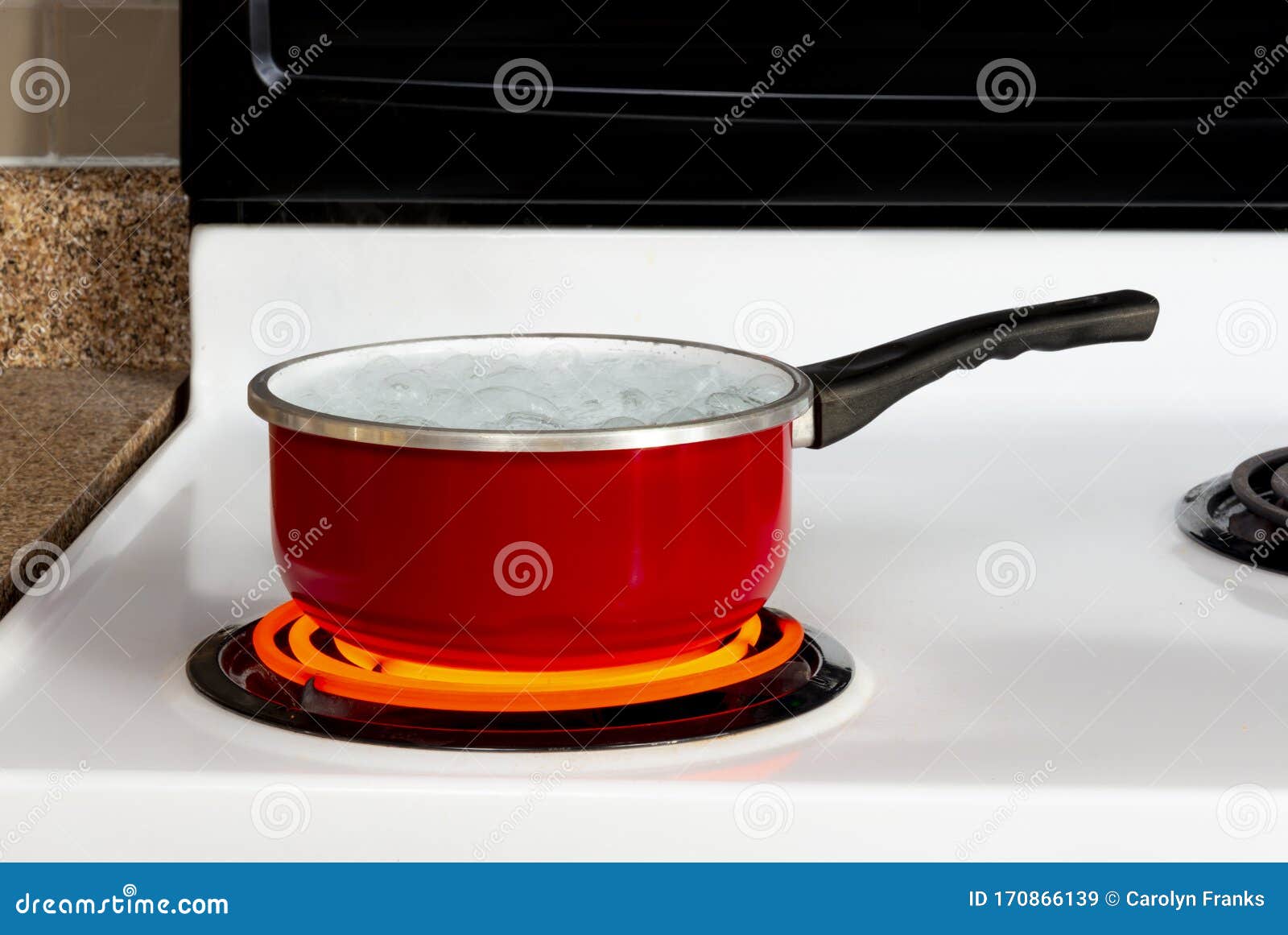 Boiling Water In A Pot On Stove Stock Photo, Picture and Royalty Free  Image. Image 22669605.