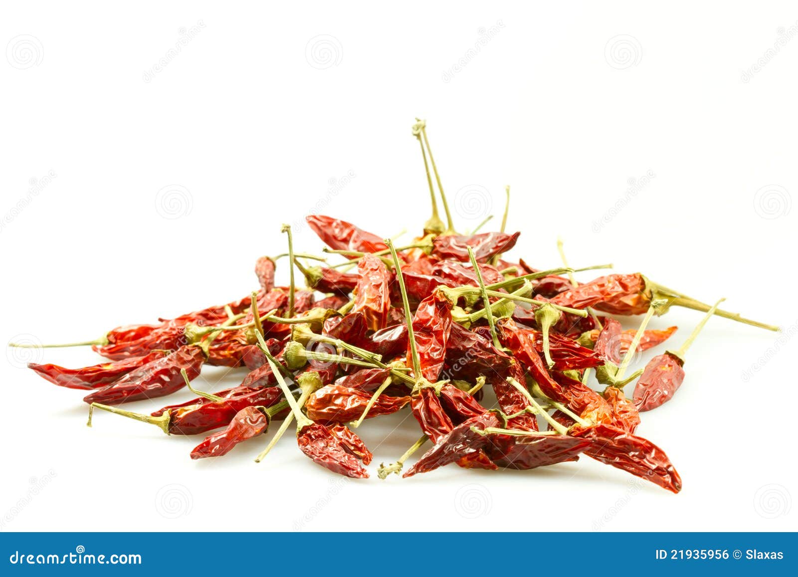 handful of dried red peppers isolated on white background
