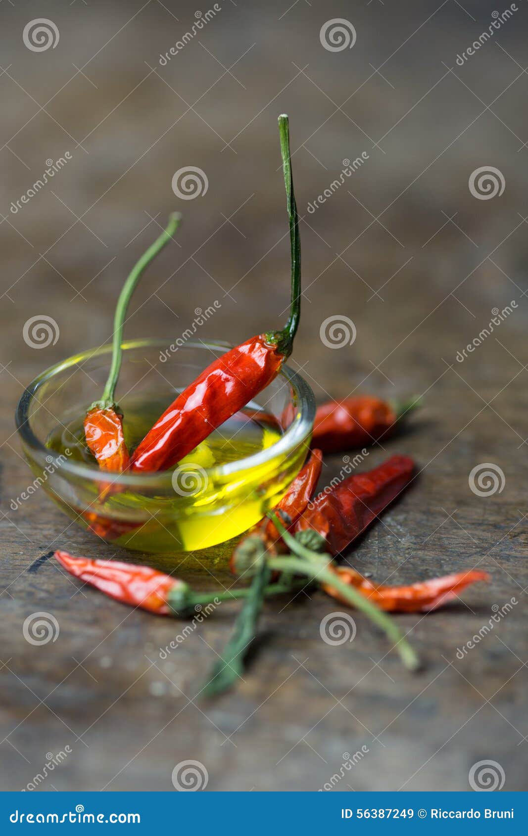 Red peppers with olive oil stock image. Image of fresh 56387249