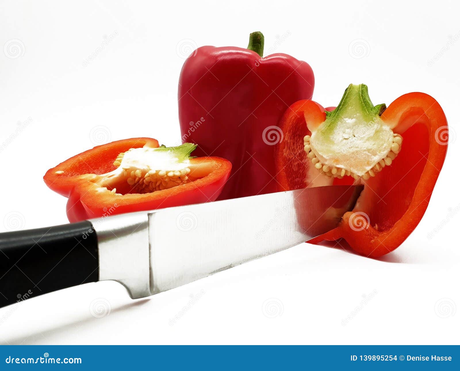 red peppers and released on white background freeholder